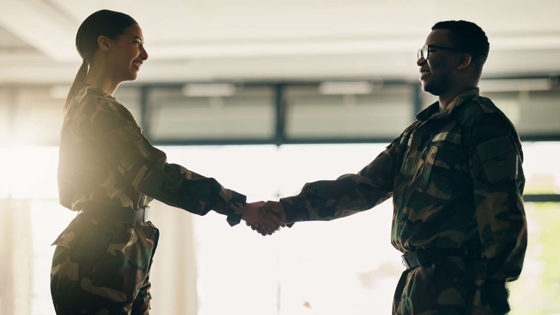 Professional man featured in a career spotlight, showcasing transition from active duty to civilian role.