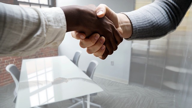 Law360 logo on a blue background related to employment regulations.
