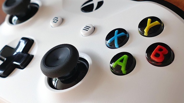 Futuristic modular gaming controller in a space-themed setting