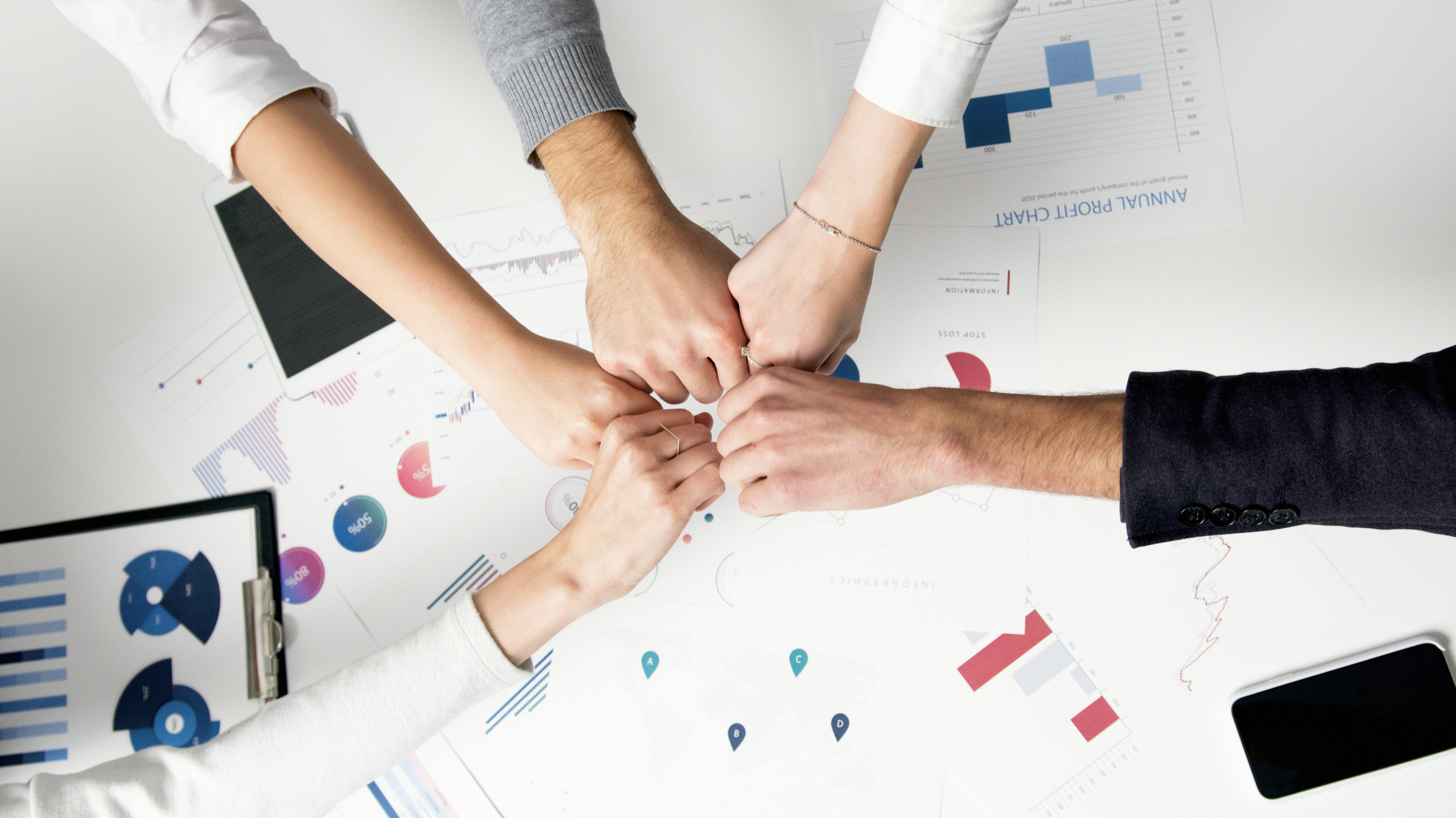 Networking at Quinlan Career Week, young professionals engaged in conversation.