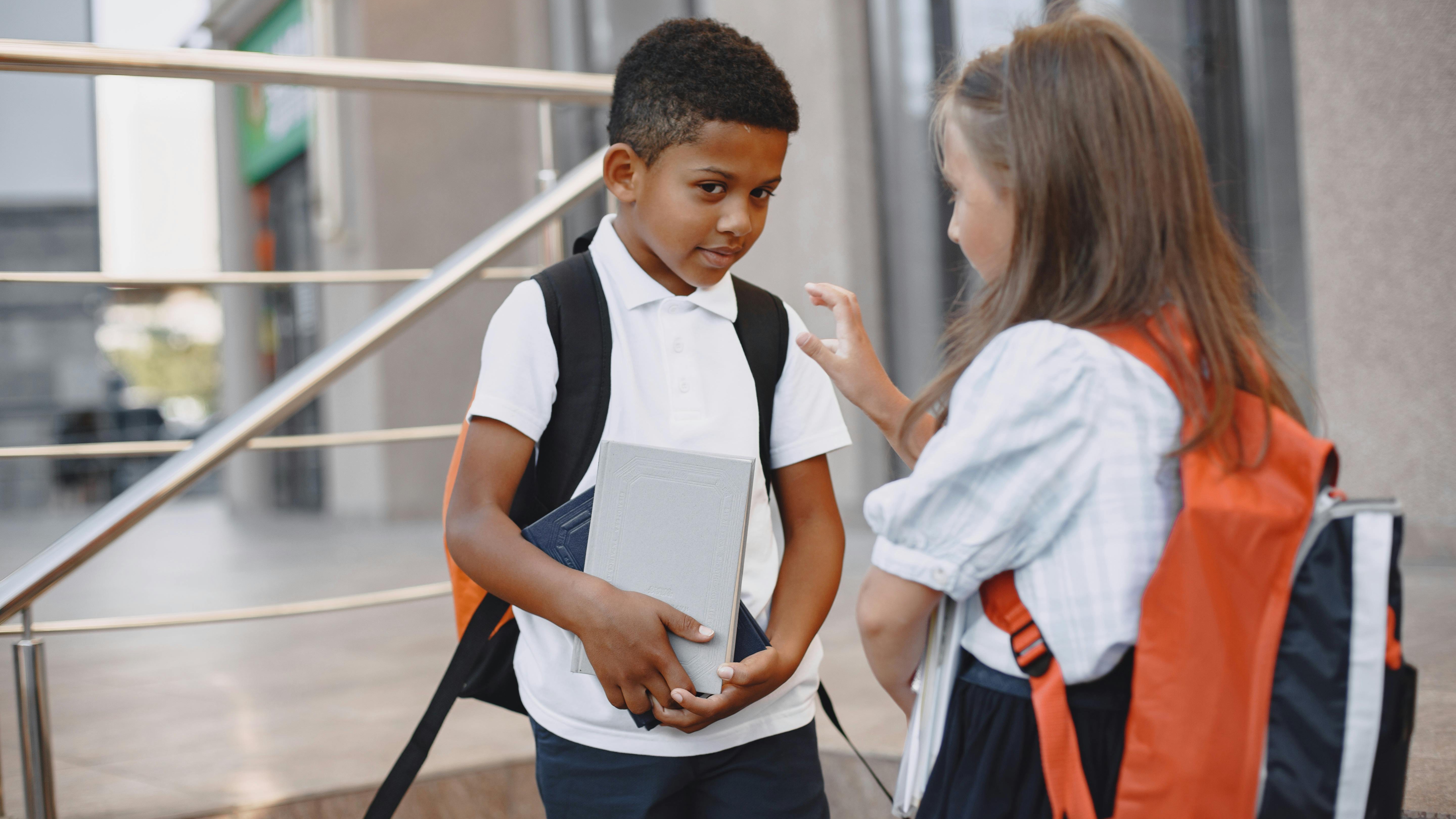 Mother and children in morning school routine, feeling tired.