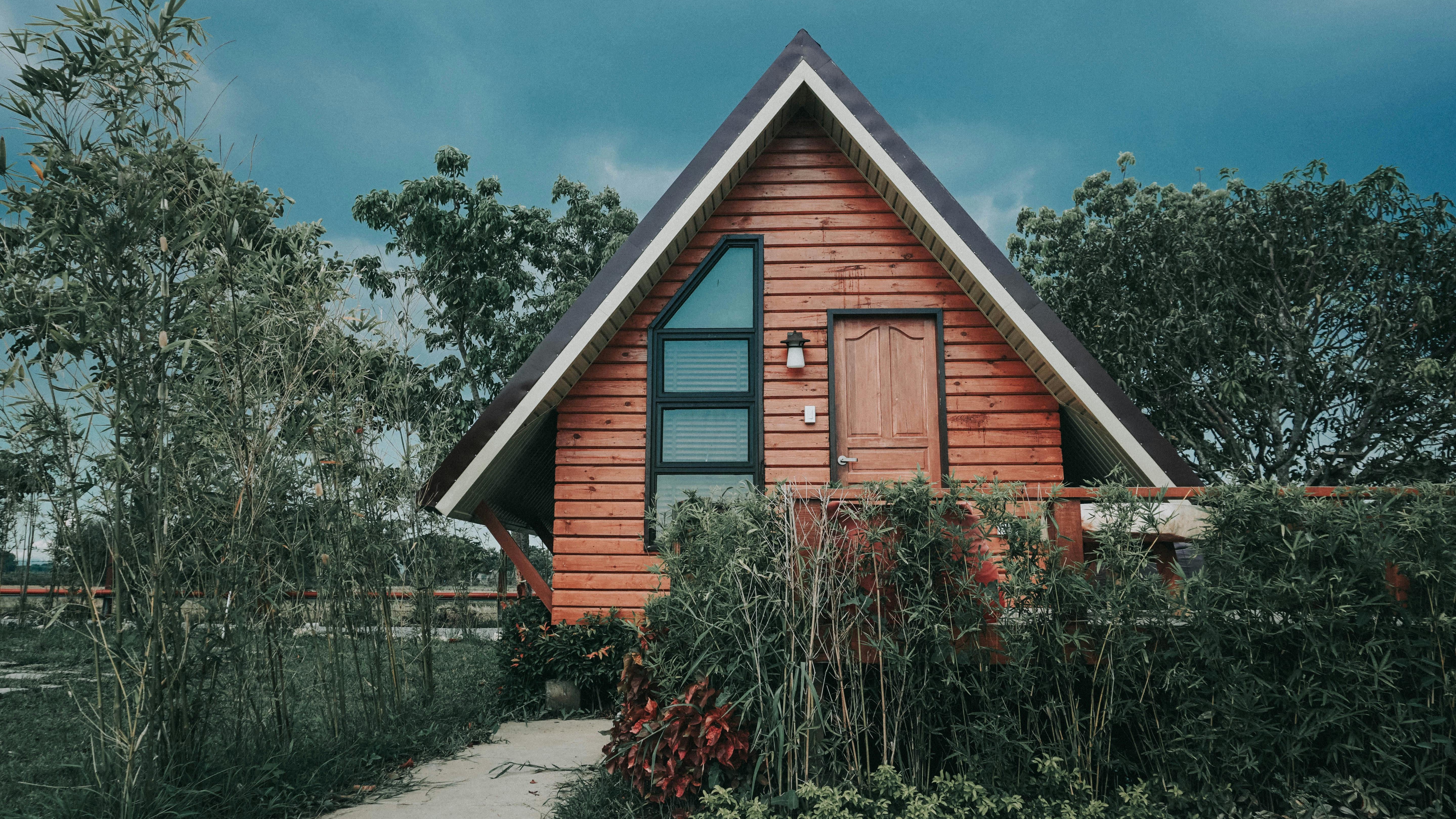 Interior of a tiny home kitchen and bathroom in British Columbia.