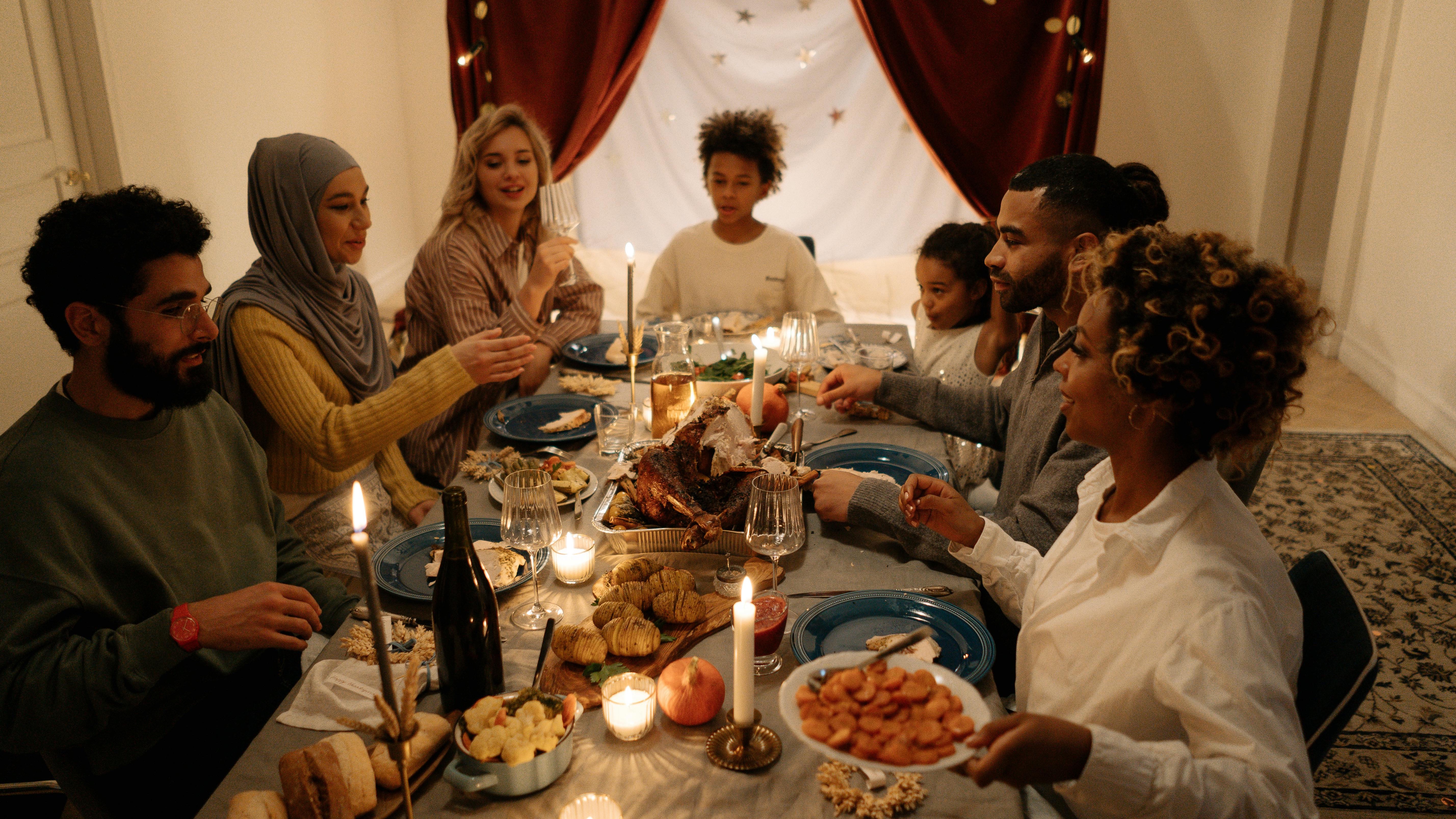 Group of women smiling indoors for Thanksgiving truth Omaha.
