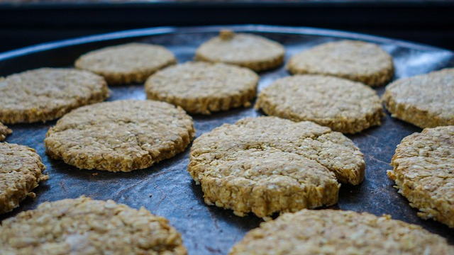 Homemade oatmeal cookies with glaze on a cooling rack for healthy family meals.