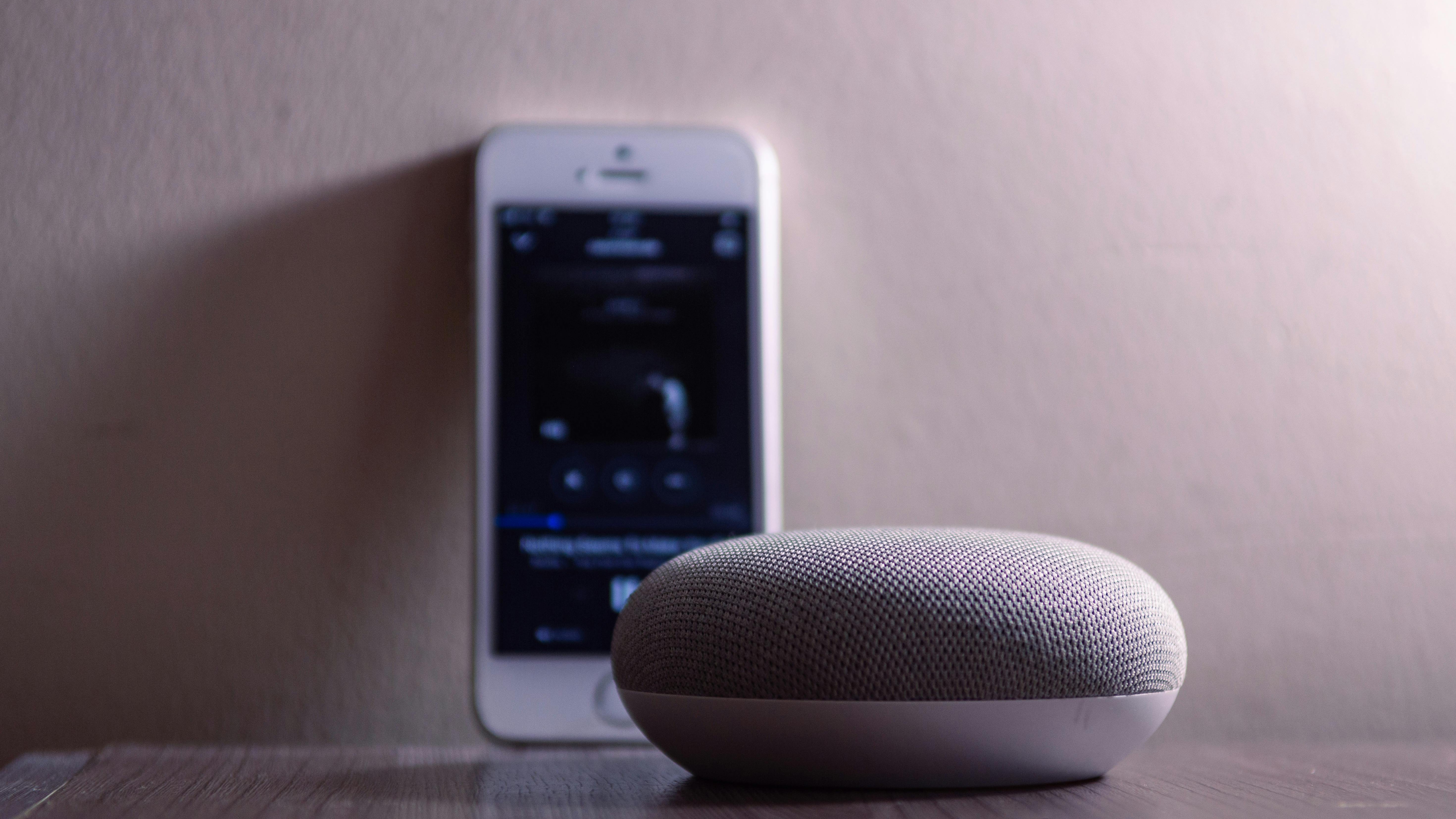 Sleek smart speaker in modern interior, hidden smart home devices.