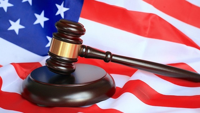 Minimalistic Law360 logo on navy background related to HR compliance.