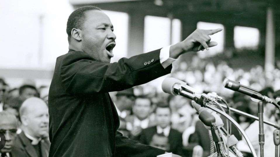 Inspire Brands Community Service on MLK Day event with diverse group.