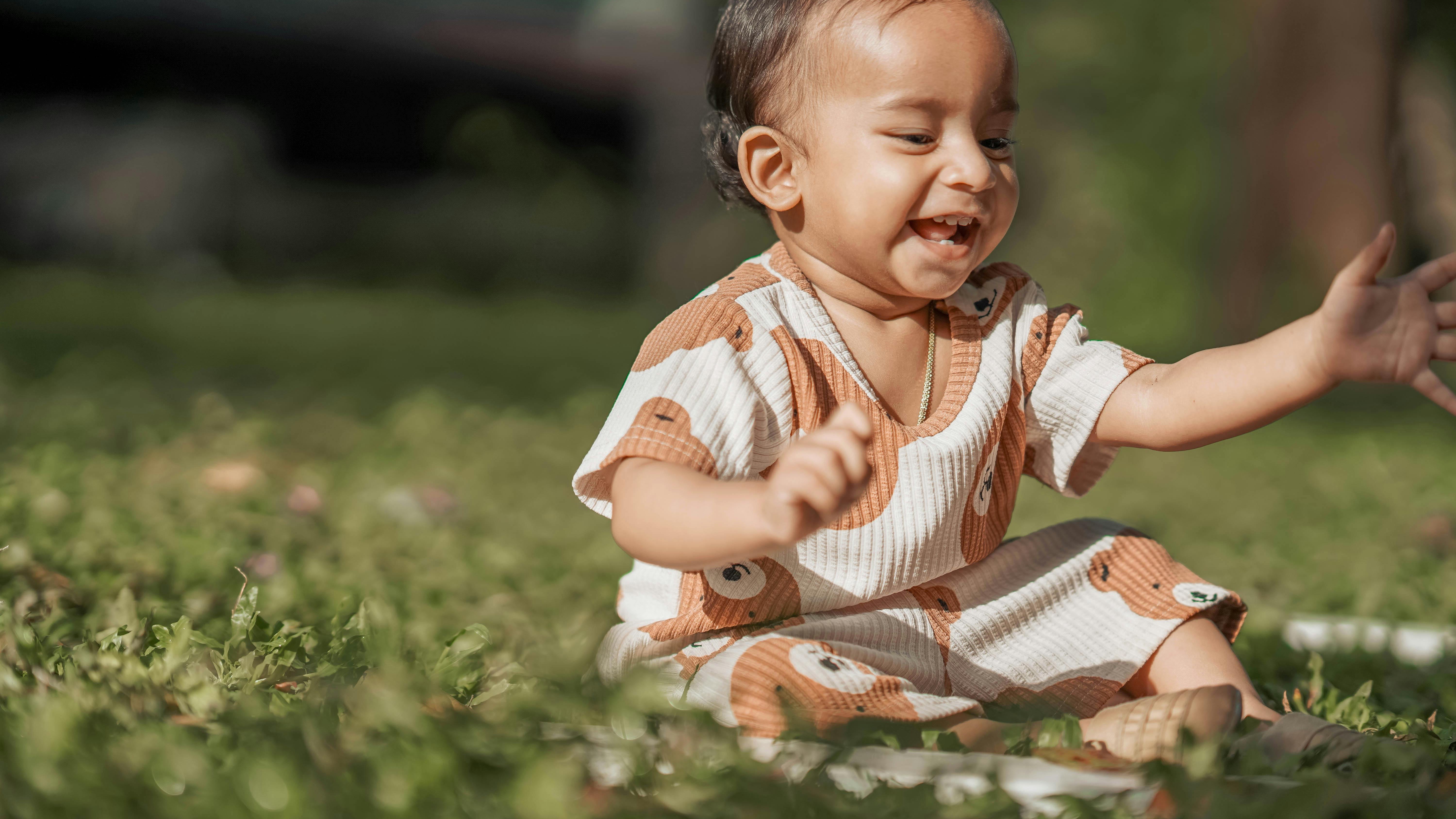 Toddler behavior tips: crying toddler being comforted outdoors.