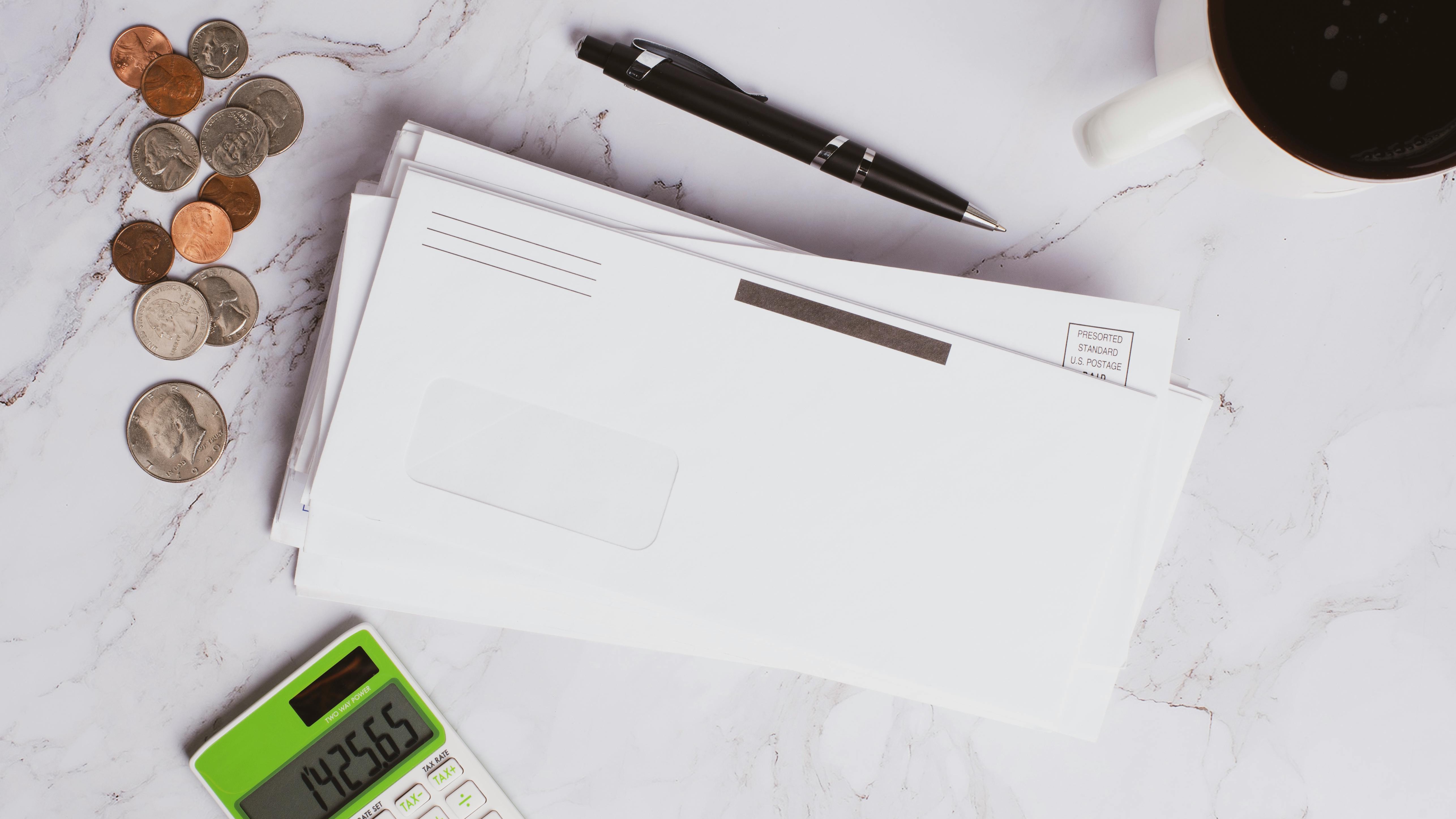 Envelope with check showing rising health premiums cost