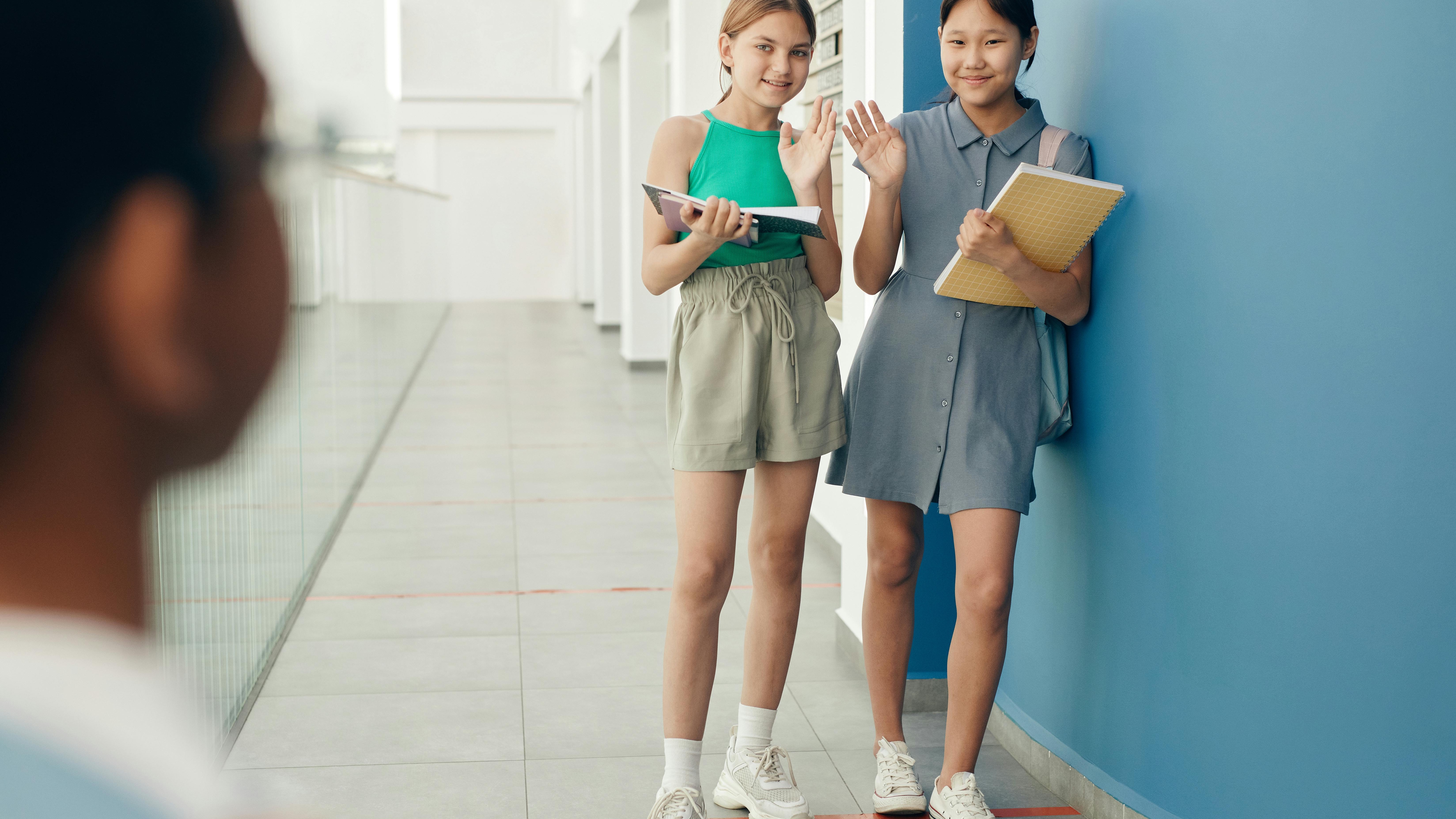 Cheerful teenage girl enjoying the outdoors, symbolizing teenage communication.