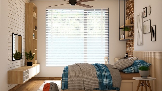 Calm and inviting bedroom decor with soft pillows, flowers, natural lighting.