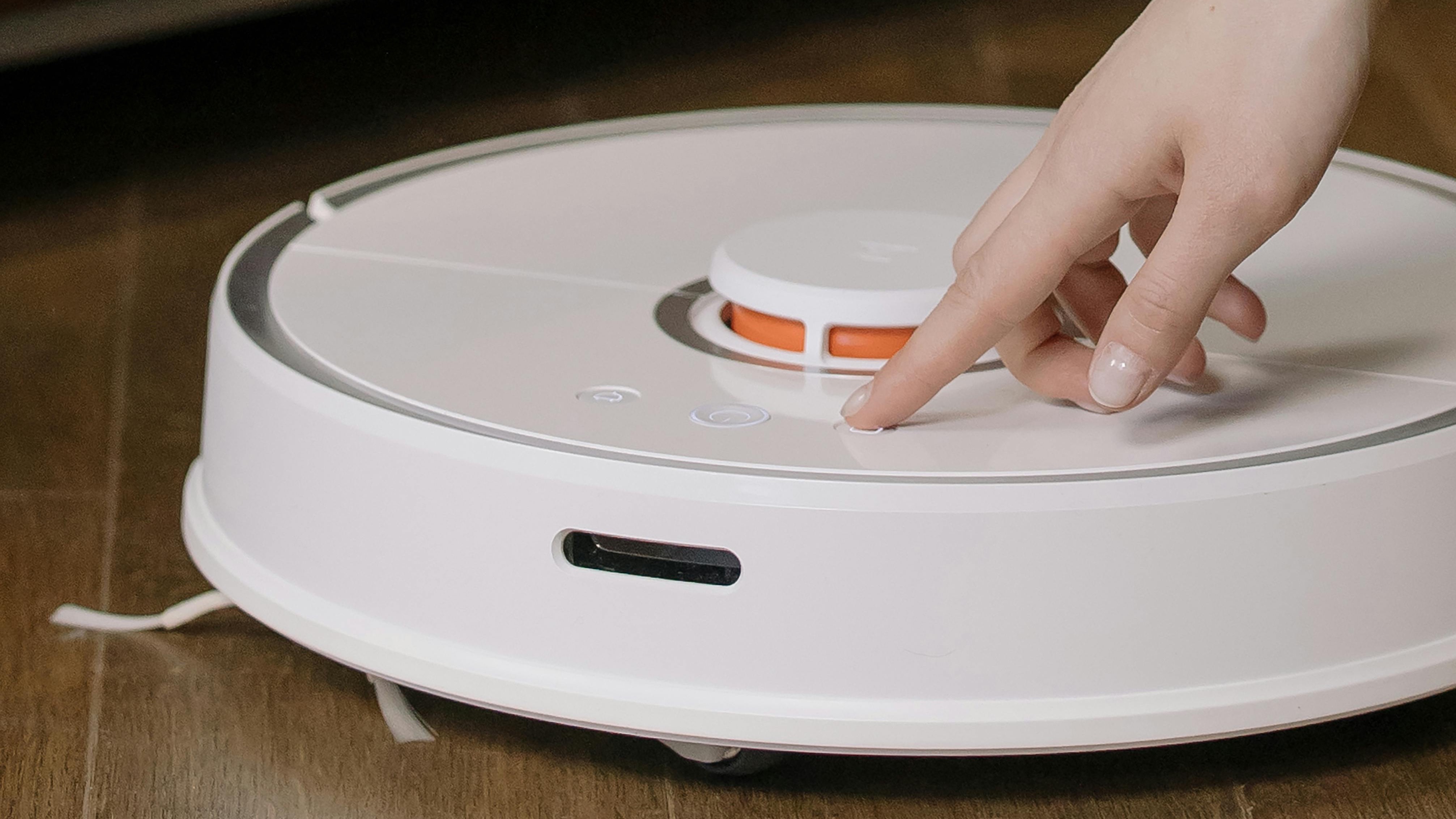 Robot vacuum on rug during Amazon Spring Sale robot vacuums event.