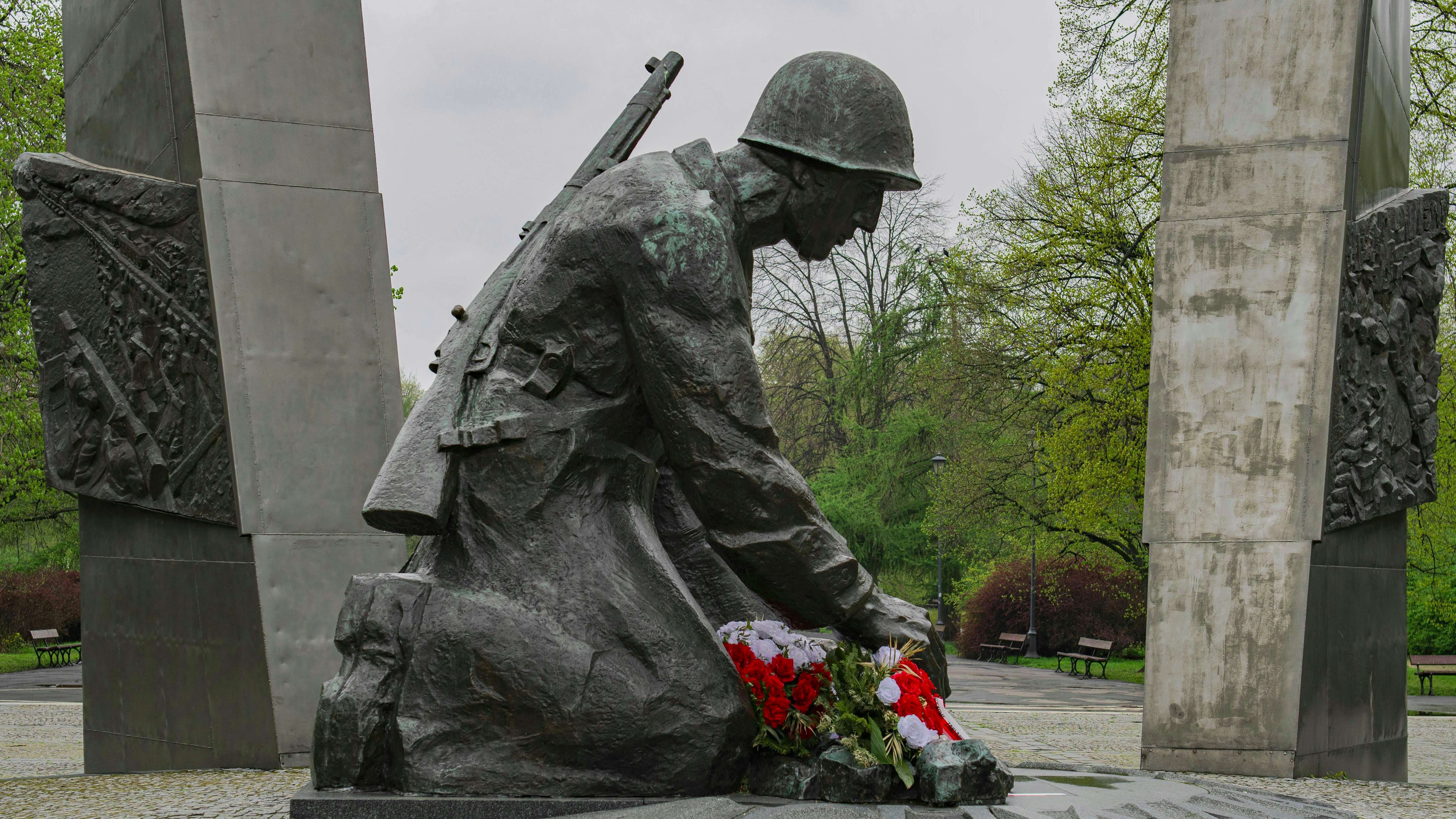 Silhouette of a mysterious figure with optics against a wall