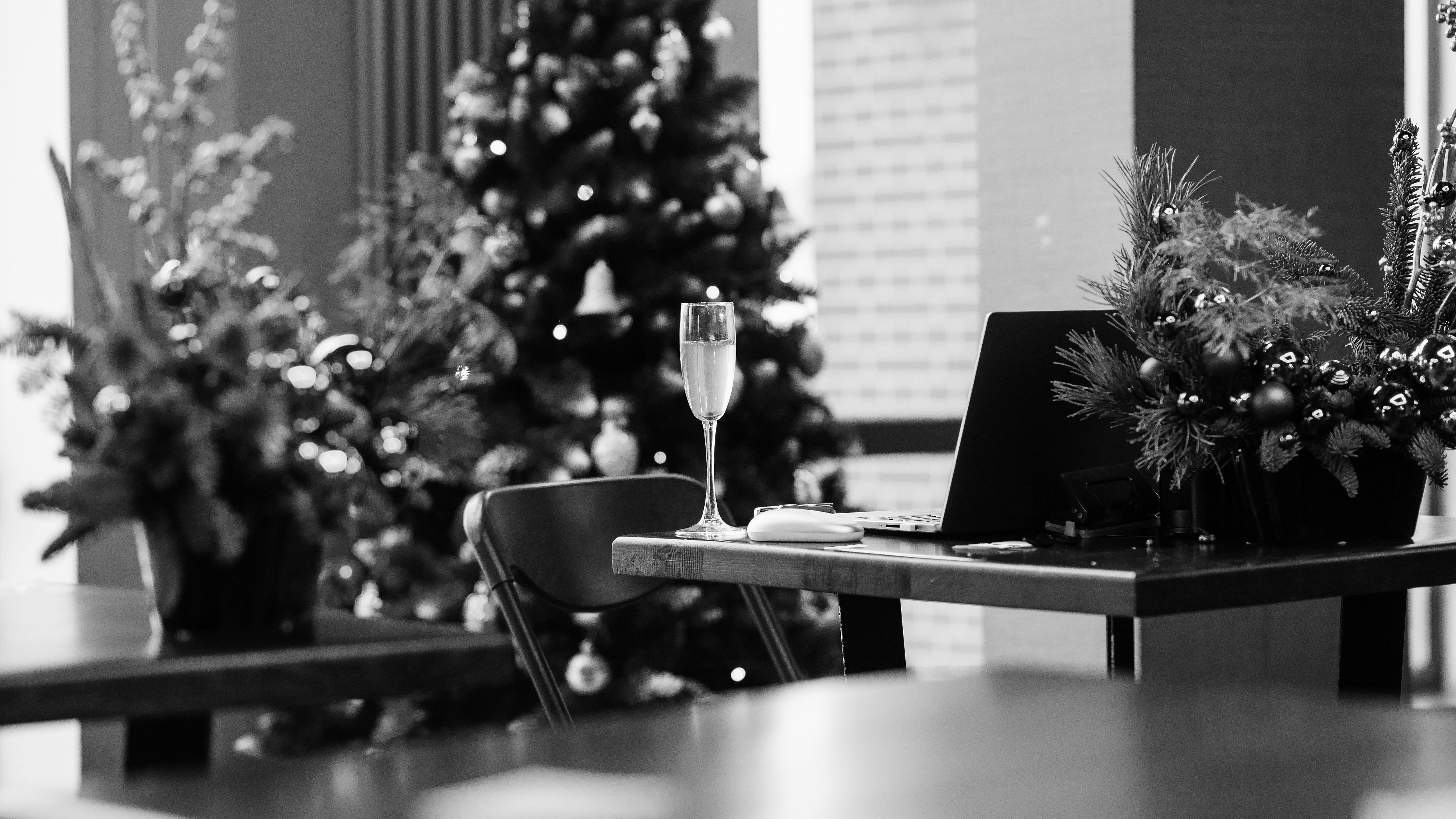 Cartoon celebration of personalized employee recognition with gift and balloons.