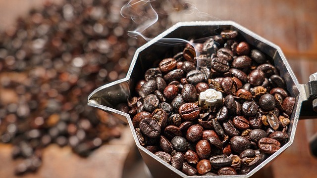 Chrome La Pavoni Europiccola lever espresso machine on countertop.