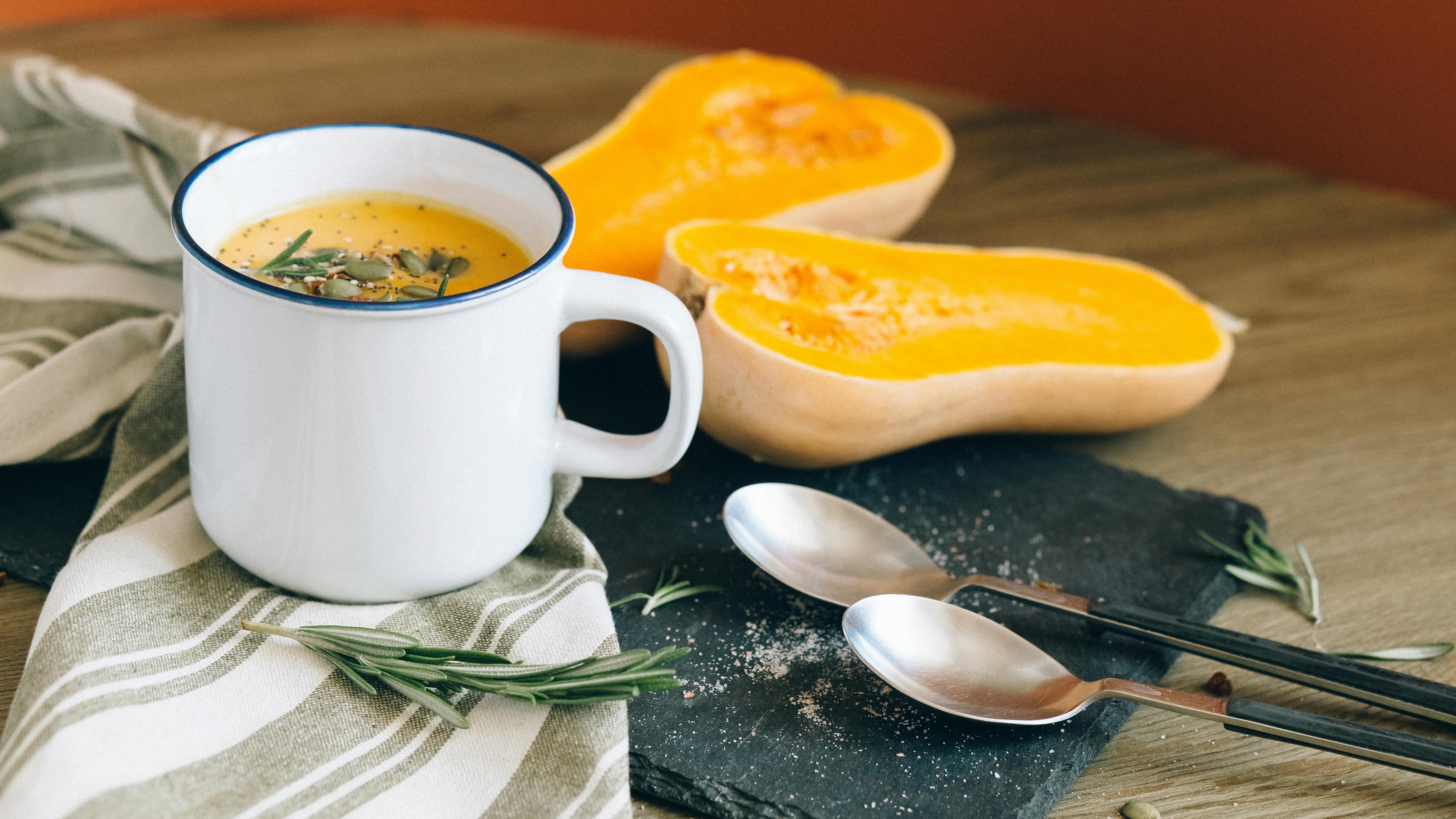 Fresh banana bread cooling on a plaid cloth, perfect for healthy family meals.