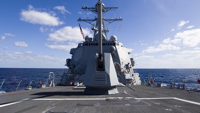Naval Combat Demolition Units on a beach with inflatable boat