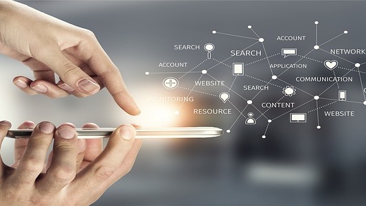 Close-up of microphone capturing voice data for AI with audio waves on screen.