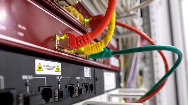 T-Mobile 5G Home Internet router displayed with toy cars and a lamp.