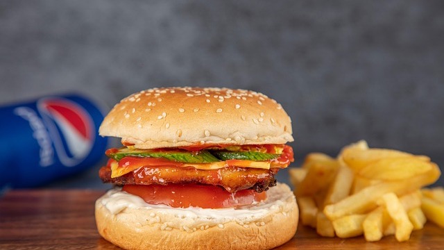 Fresh double cheeseburger at top San Antonio burger spot.