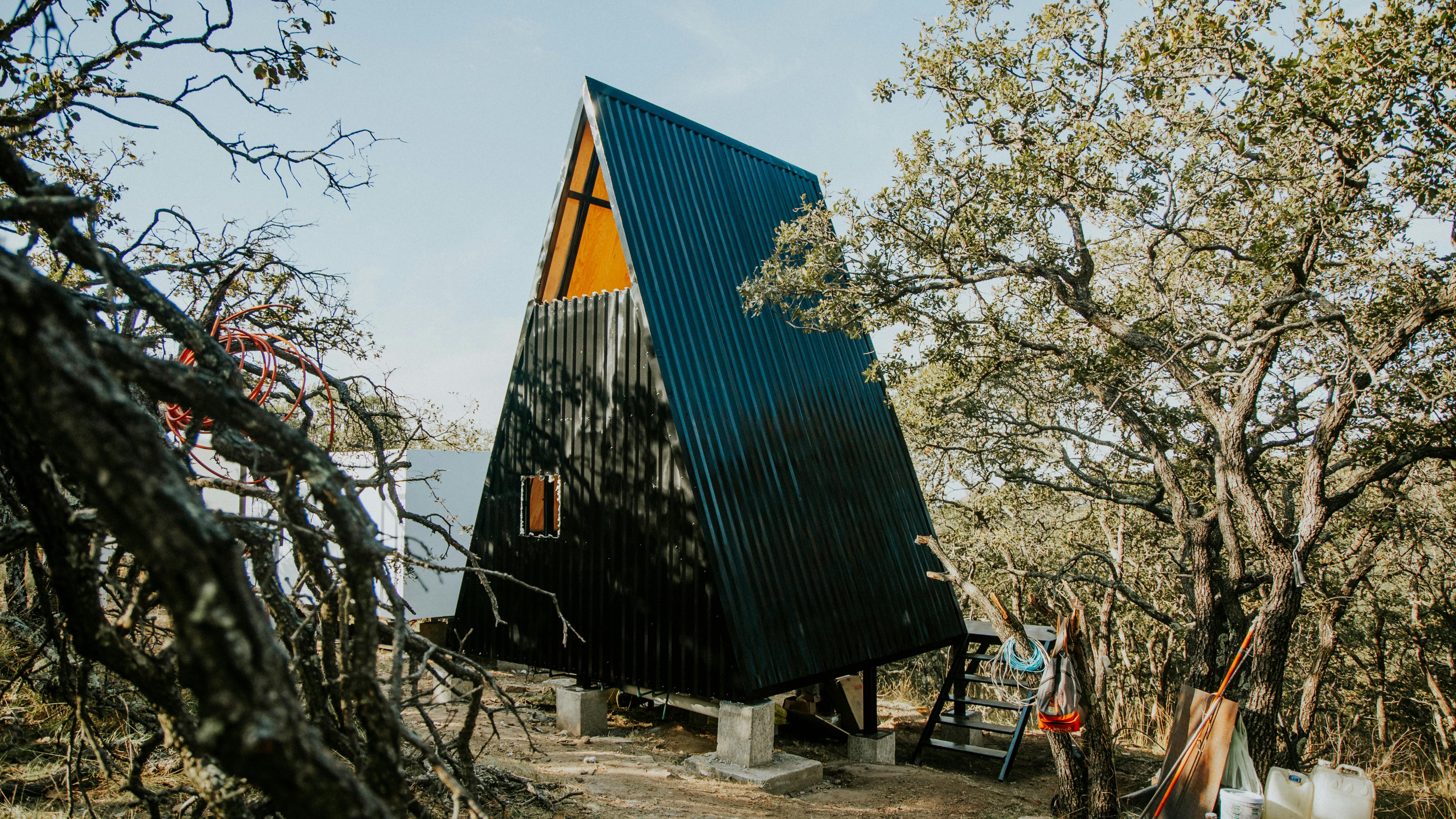 Luxury tiny house options with modern interior and ambient lighting.