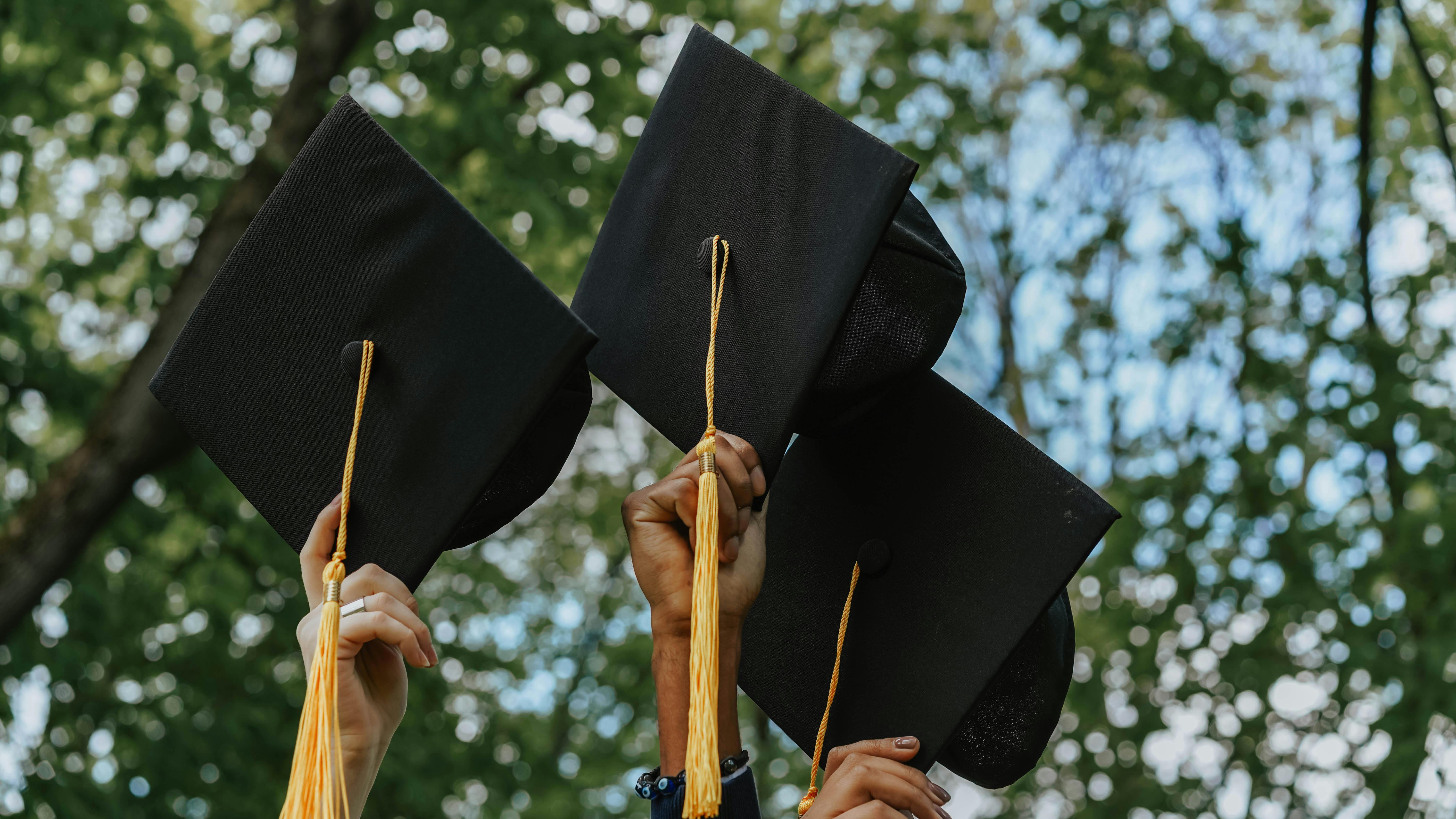College graduate humorously questions speech source amid peers; 2025 job market.