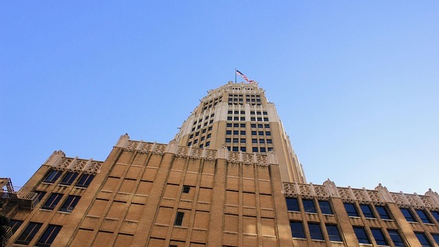 Six Flags Fiesta Texas outdoor event setup with buffet table.