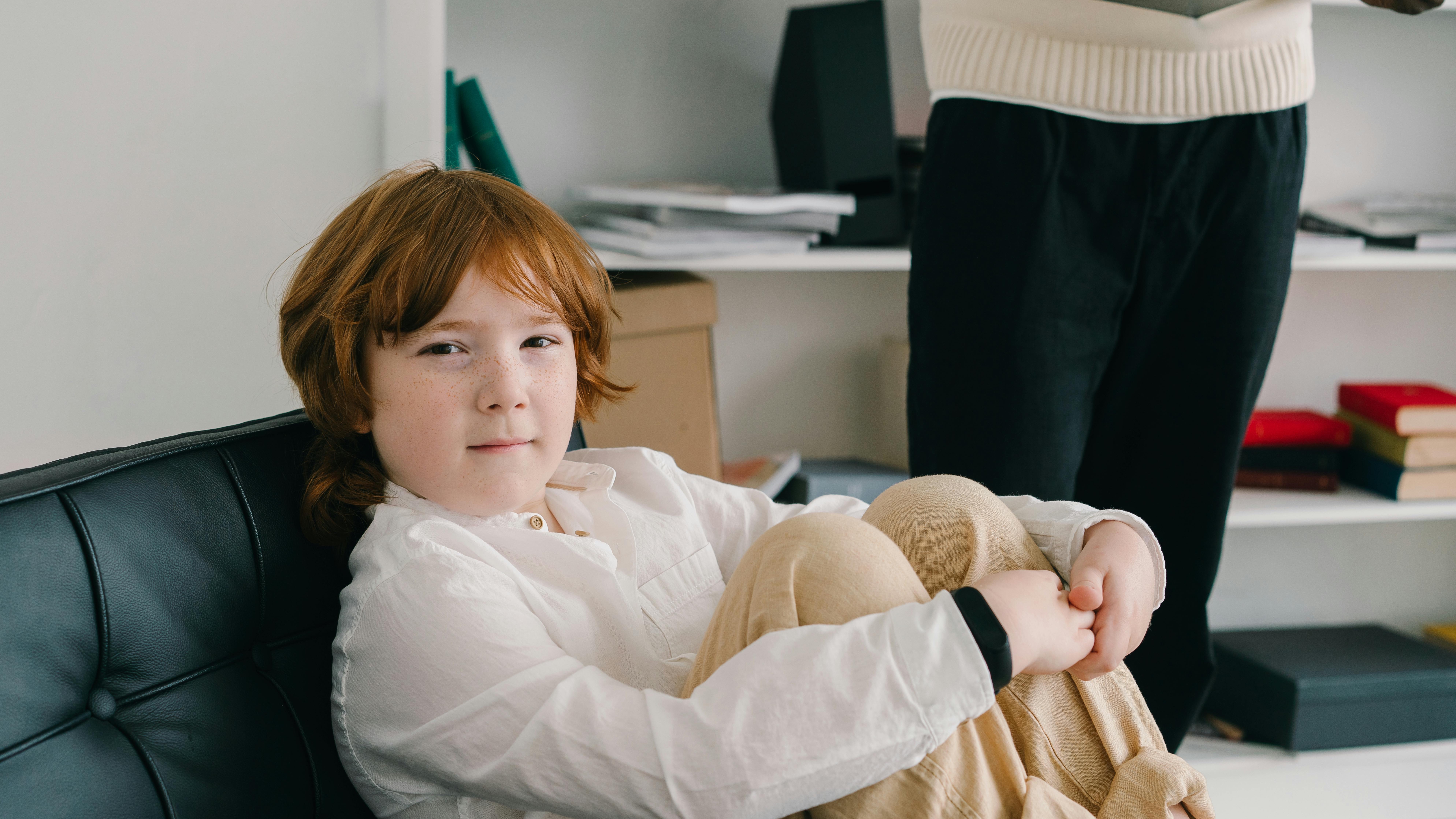 Animated woman discussing vestibular sensitivities in children during podcast.