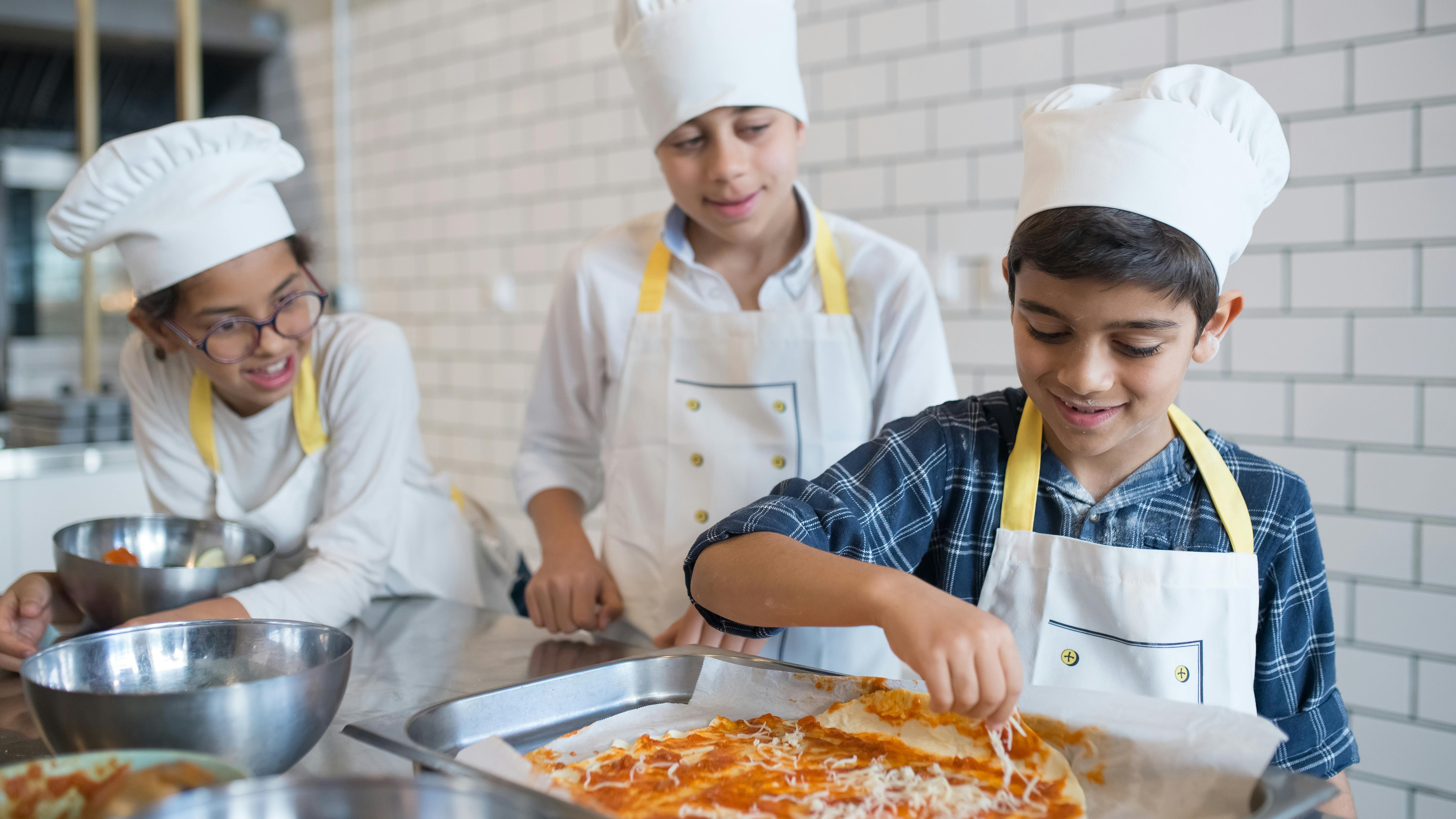 Simple 3-ingredient tortellini soup with peas in a pot.