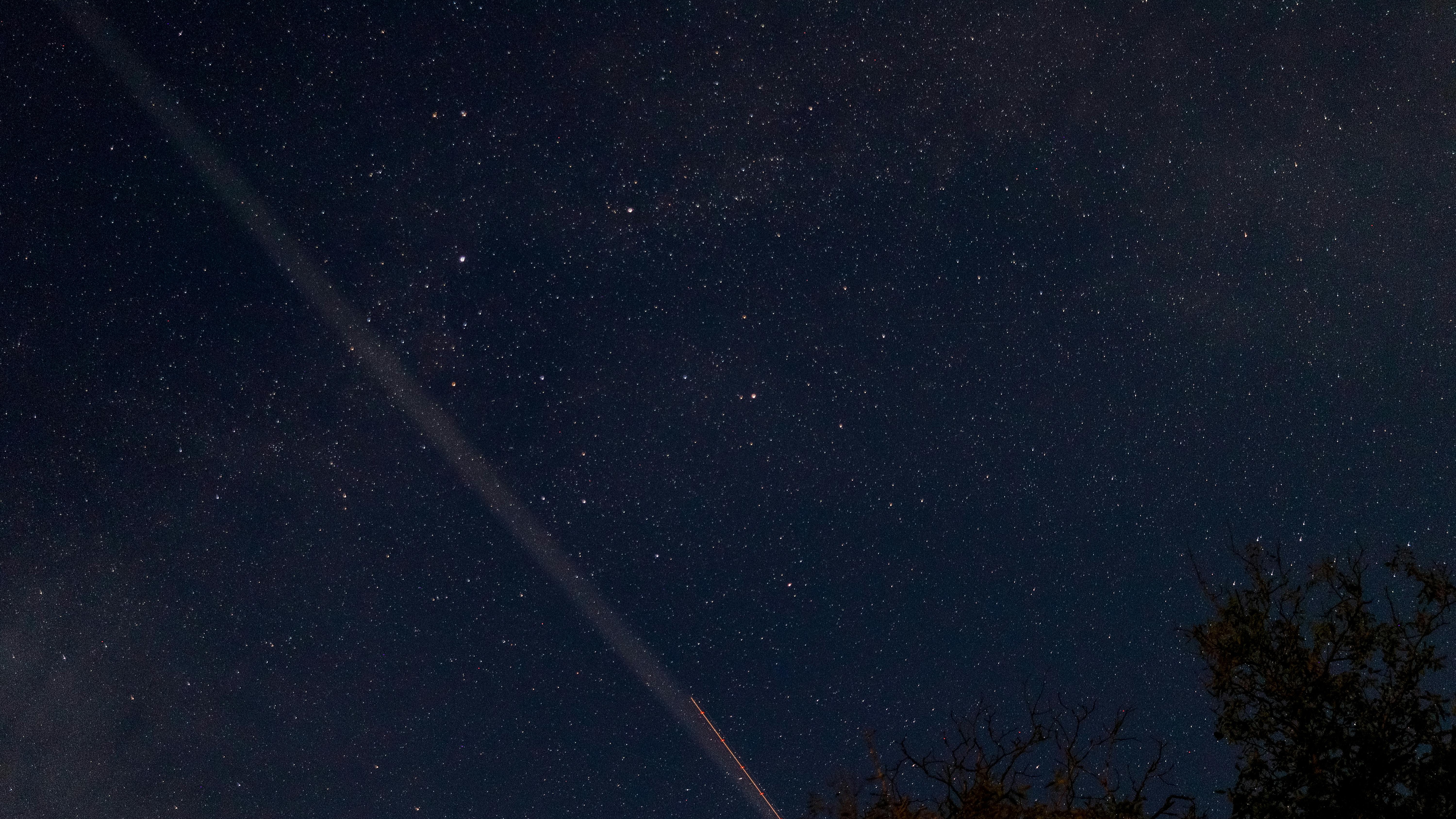 Broadband competition with Starlink visualized through 'Cable One' on a smartphone.