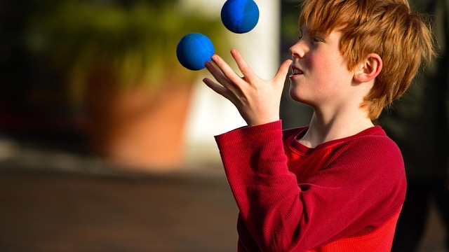 Smiling woman discussing executive functioning skills with microphone.