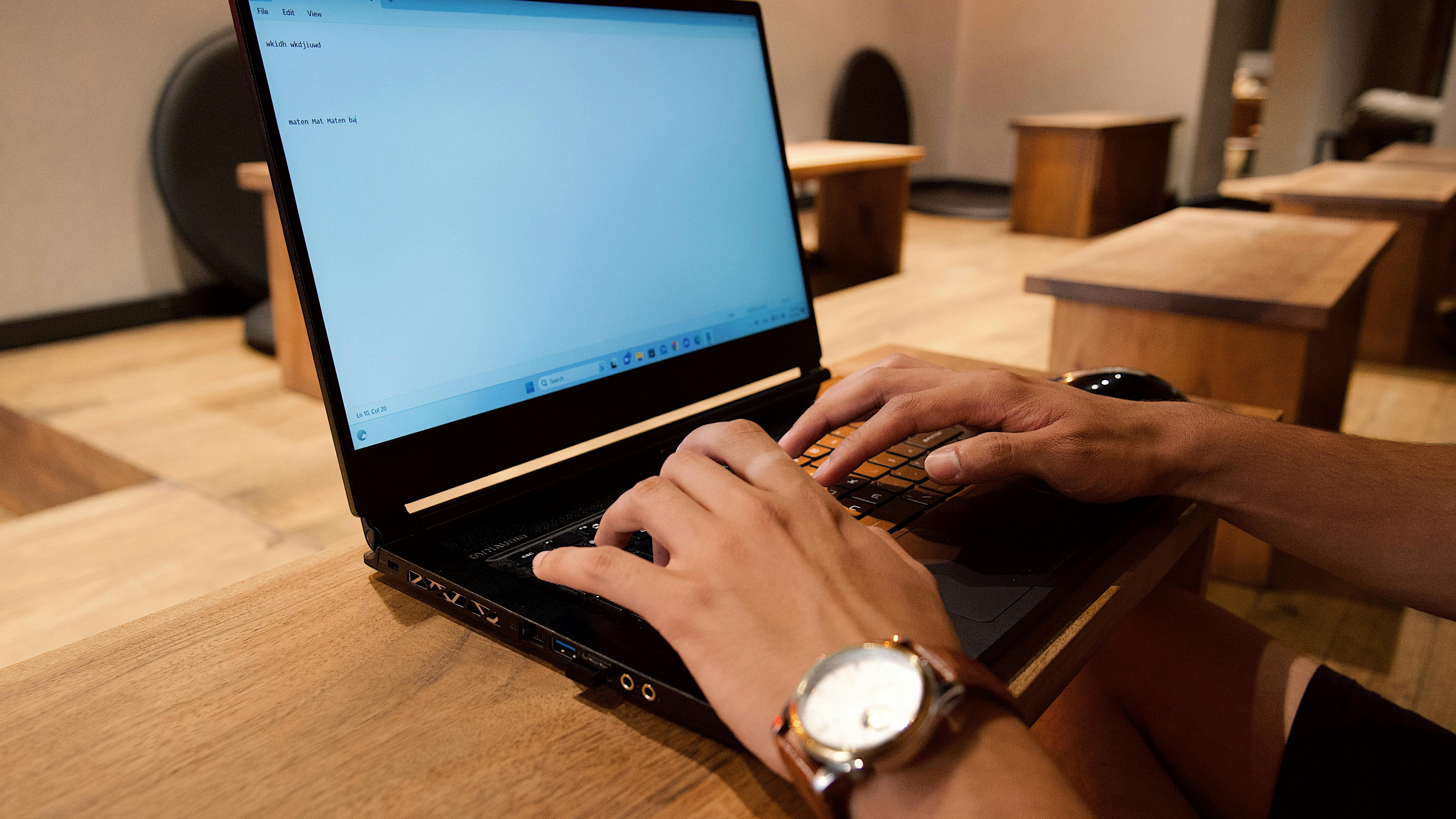 Mesh network router addressing Wi-Fi dead zones on a wooden table.