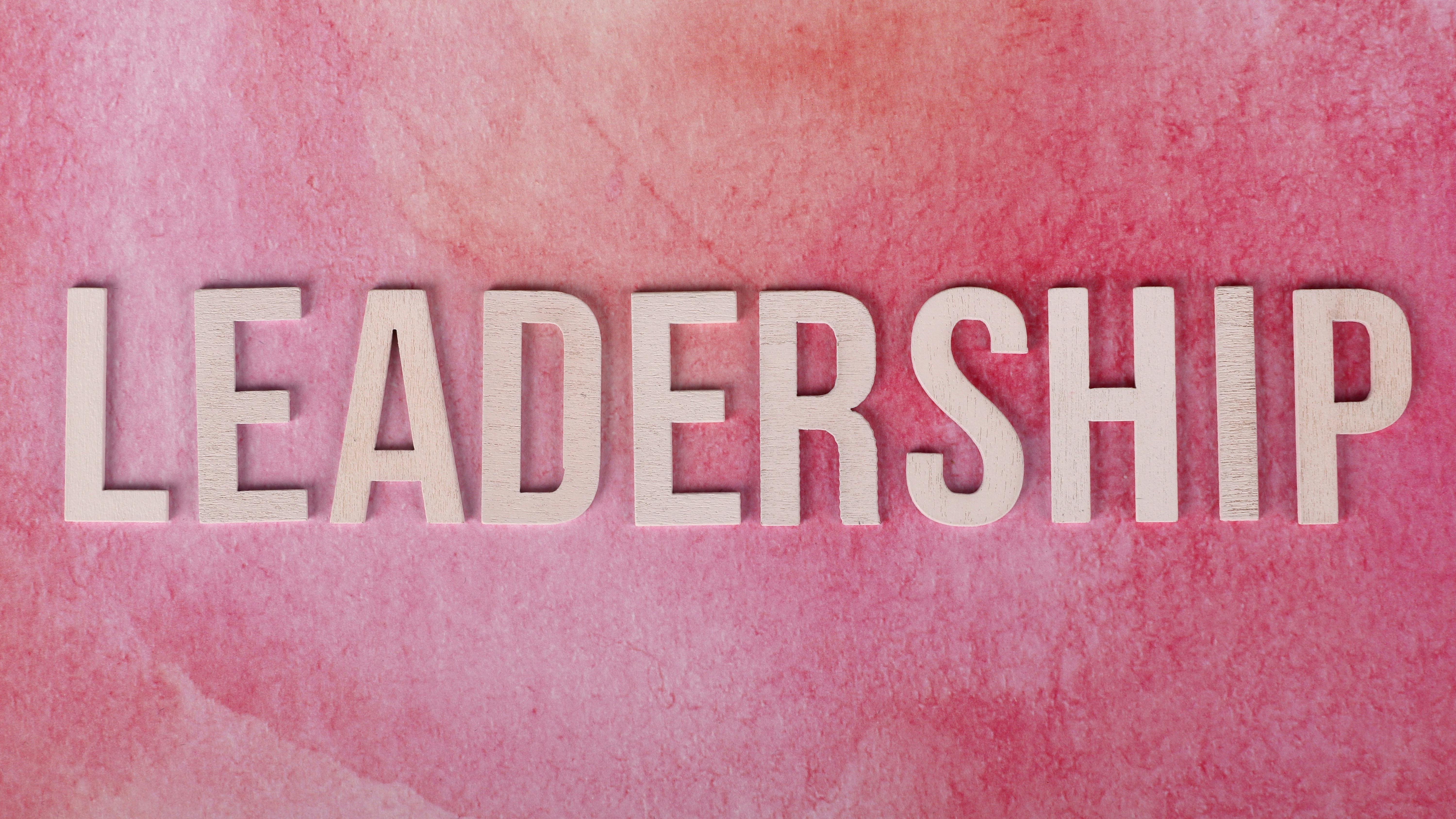 Executive leadership shifts in healthcare concept with silhouetted leaders.