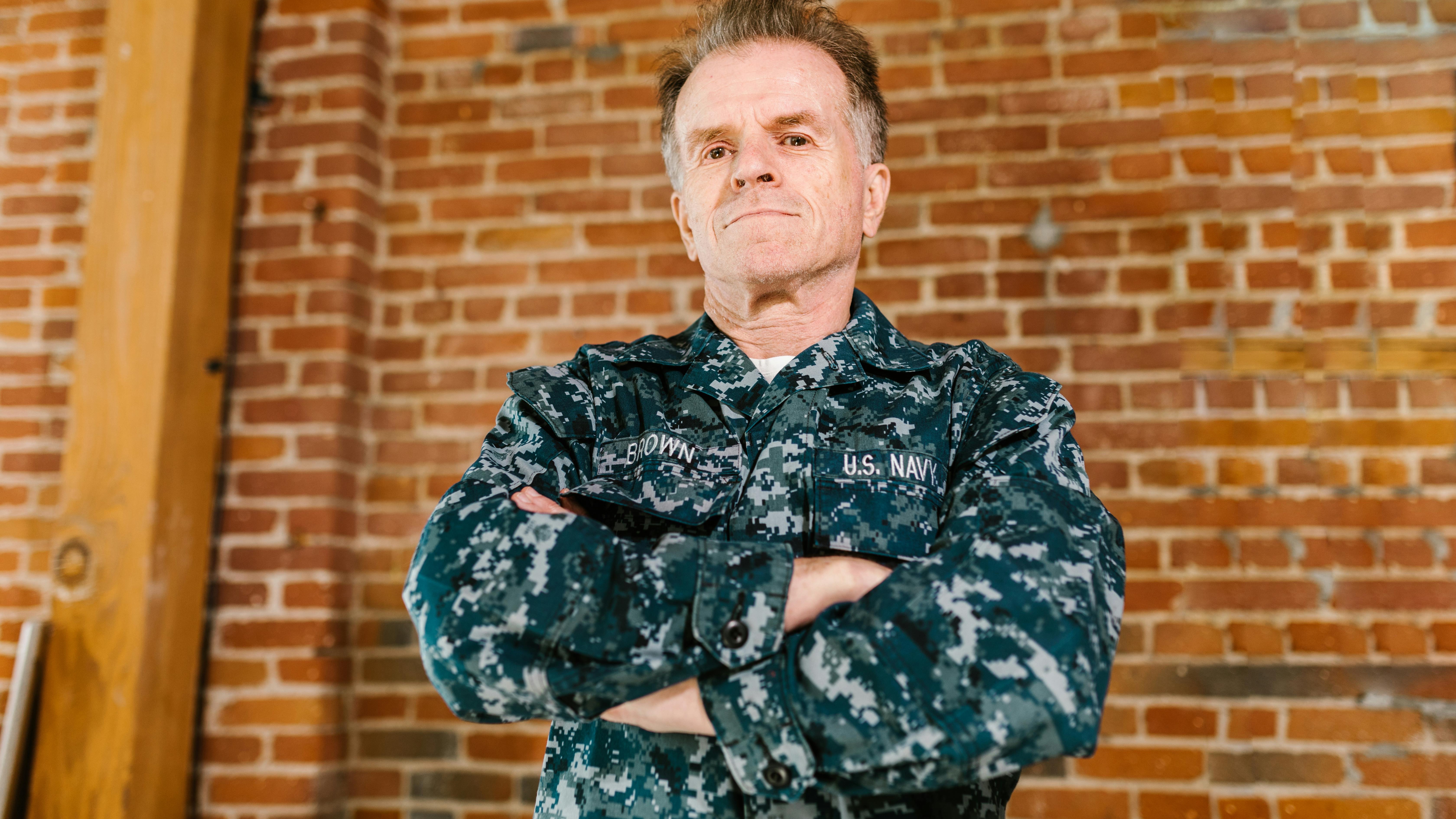 Veterans AI-Resistant Careers: Female soldier inspecting equipment.