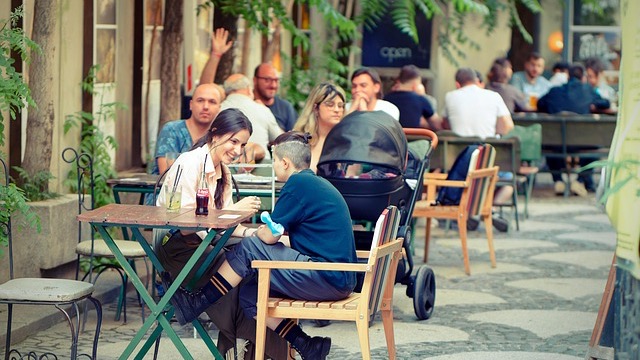 San Antonio community event with people gathered indoors for a holiday celebration.
