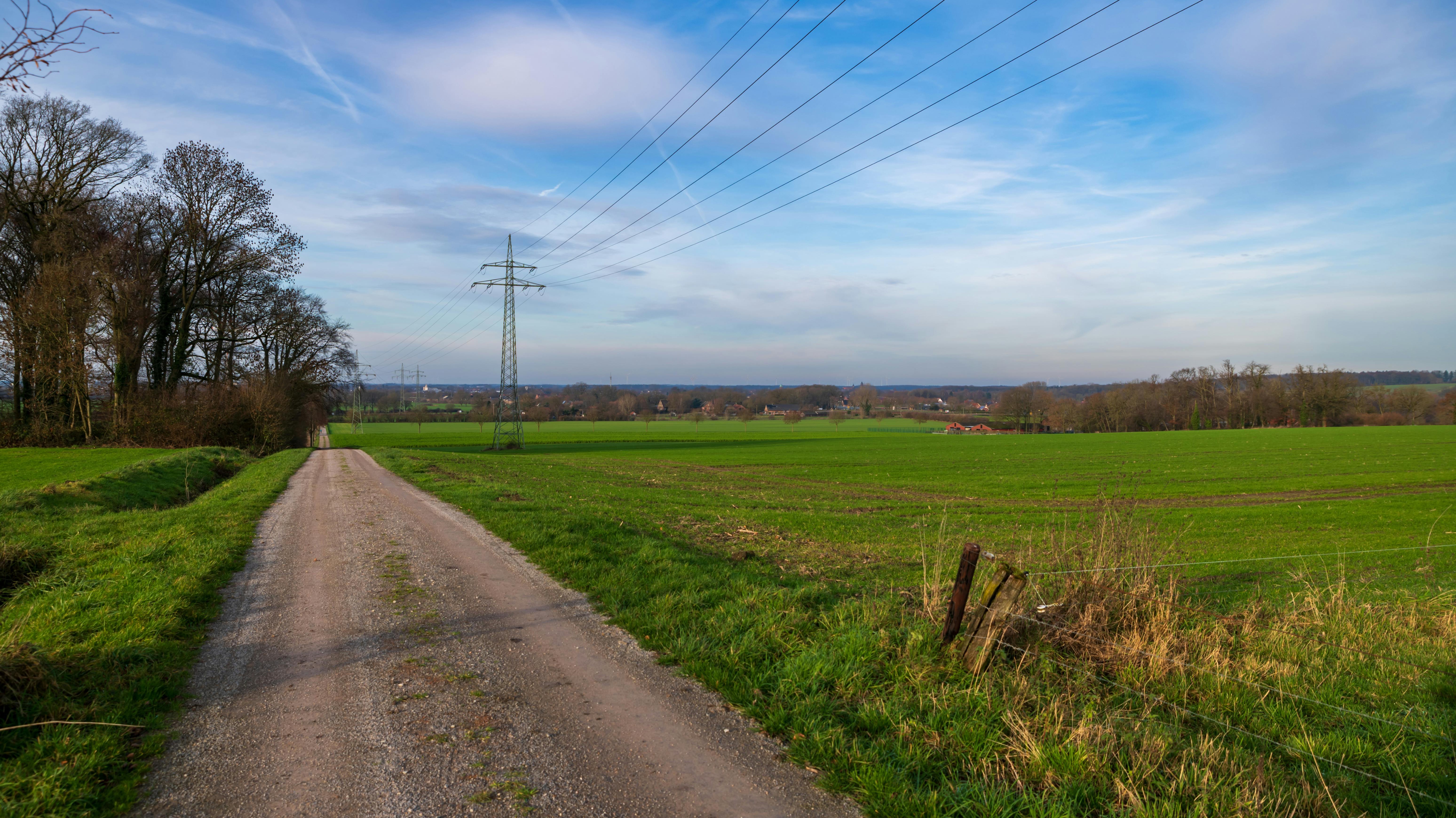 Broadband infrastructure setup with cameras in a field.
