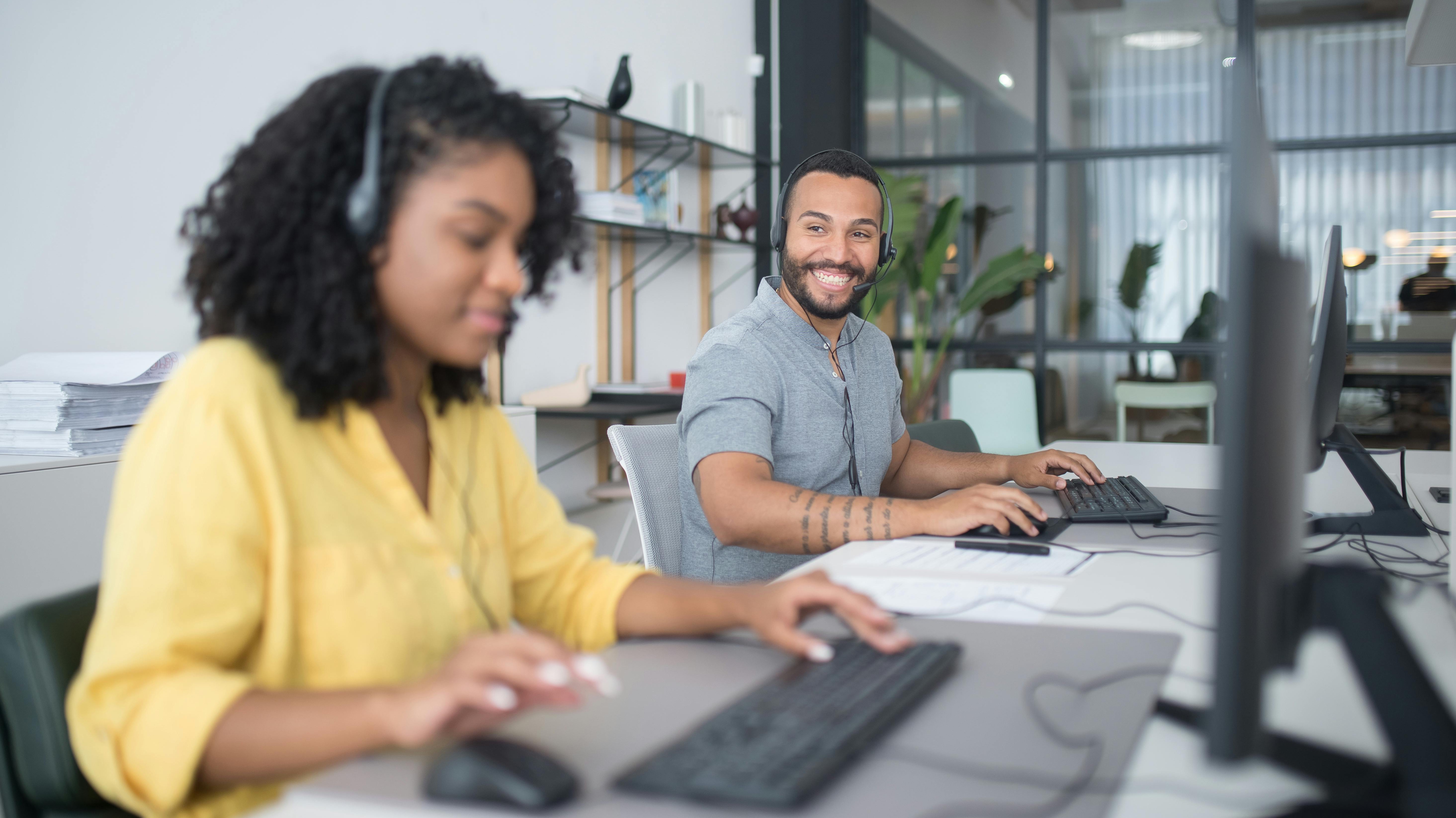 AI tools for marketing agencies: Woman at AI summit banner.