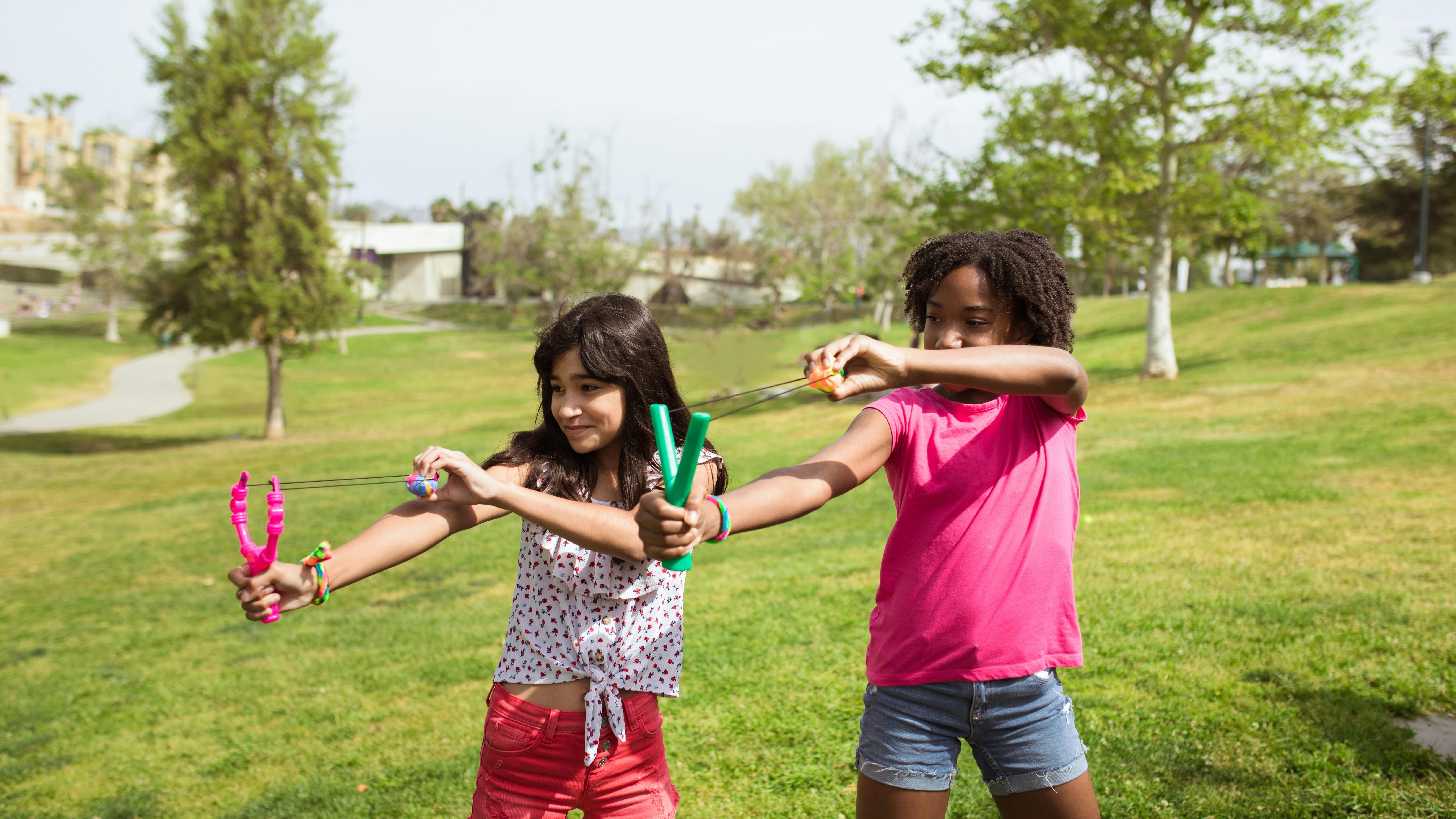 World Scholars Academy students chatting on campus lawn