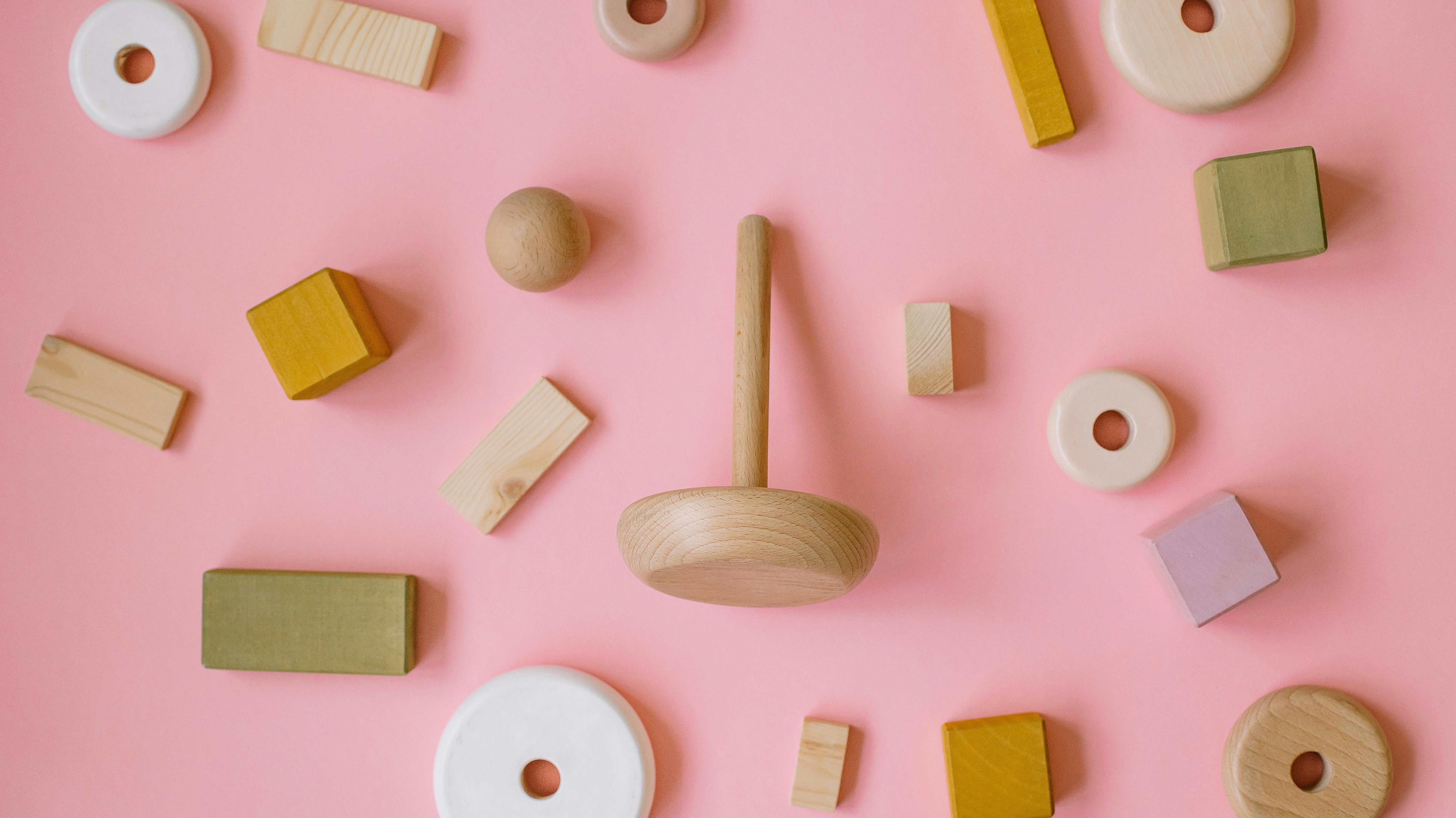 Assortment of sensory toys for children displayed on colorful background.