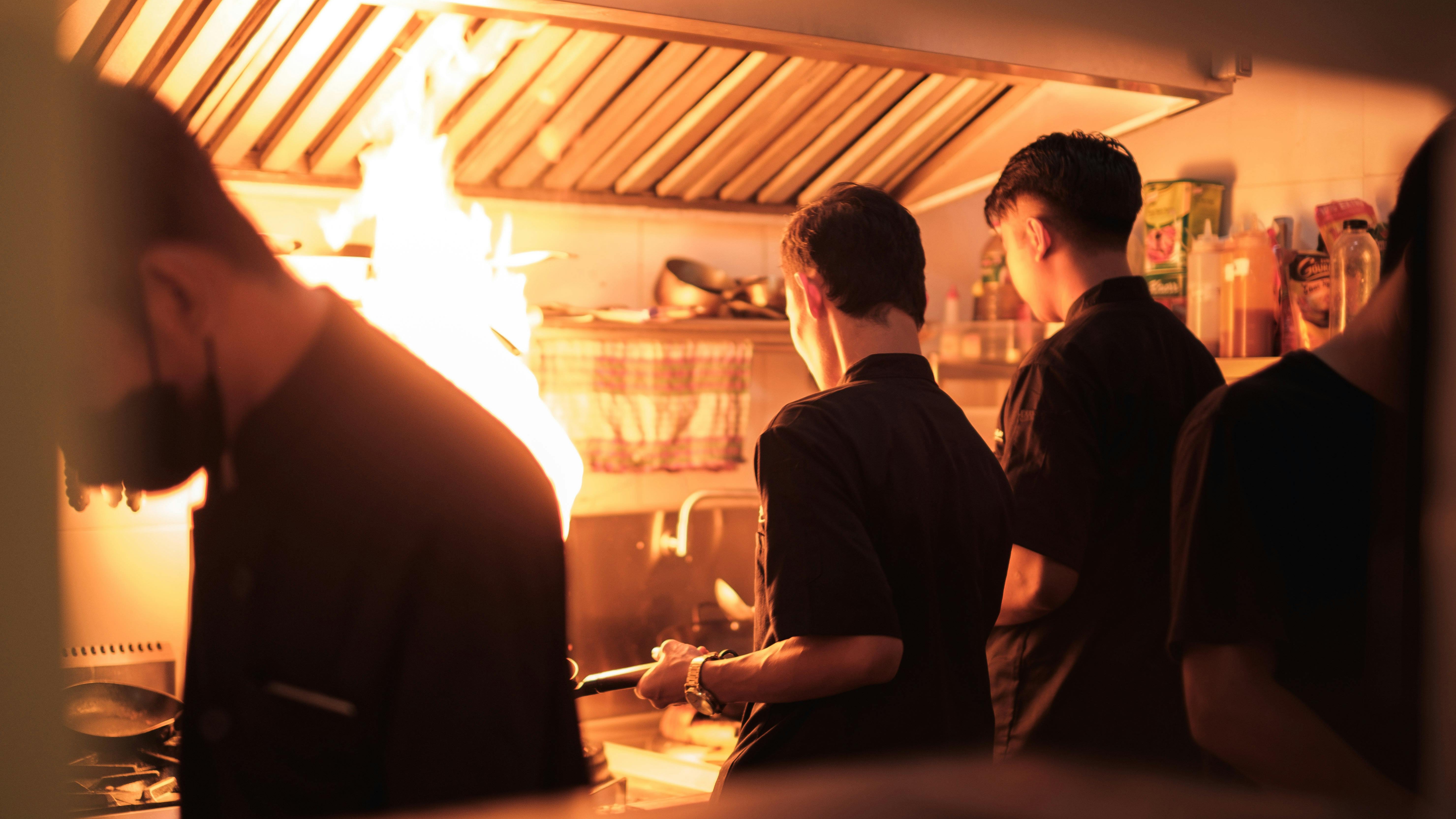 Group enjoying meal in a San Antonio restaurant, warm ambiance