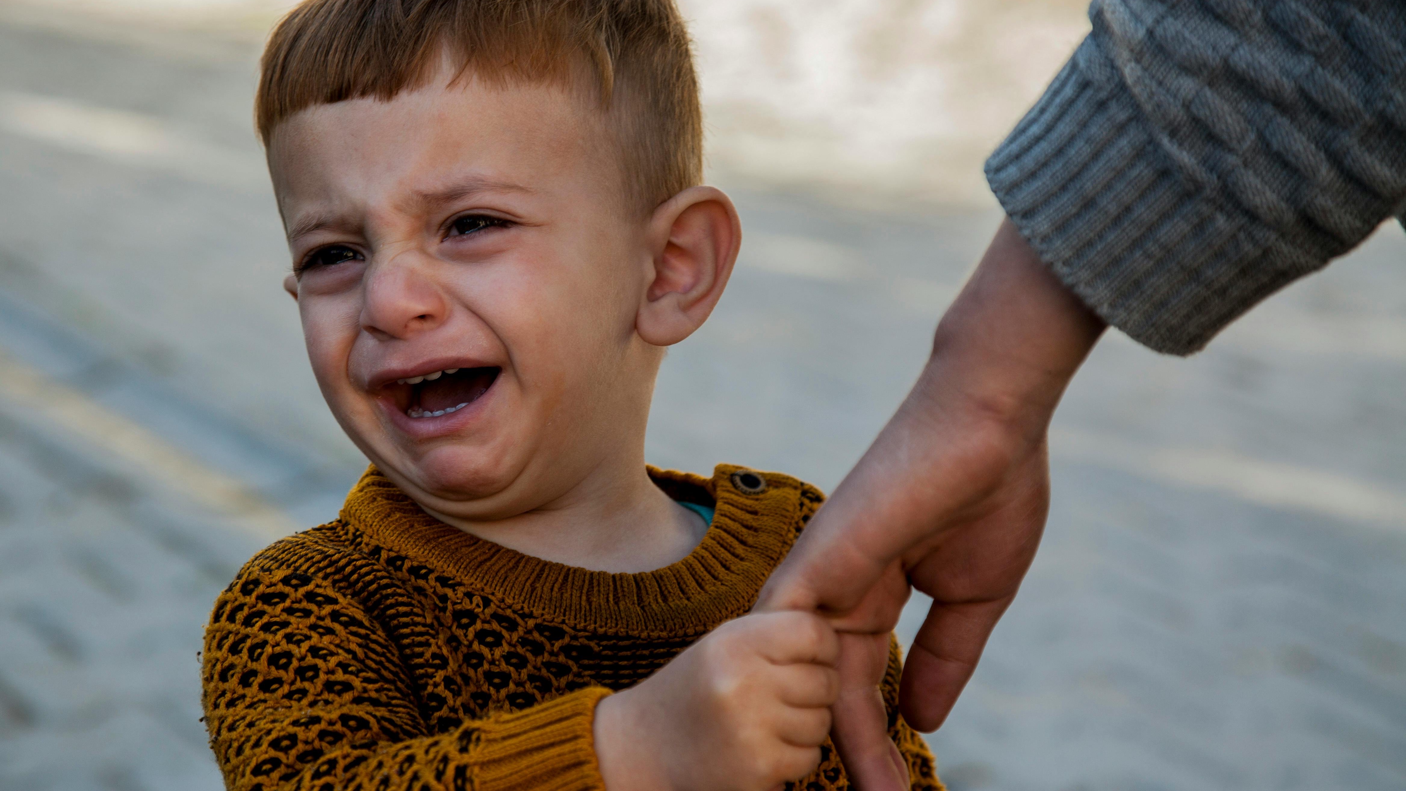 Friendly woman sharing toddler behavior tips confidently.