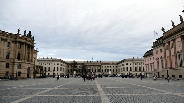 Gothic-style university building with statue, EEOC subpoena compliance.