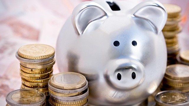 Businesswoman smiling, financial planning for parents advice featured.