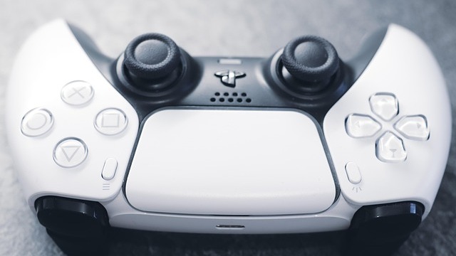 Upgrade to PlayStation 5 Pro console and controller displayed on blue background.