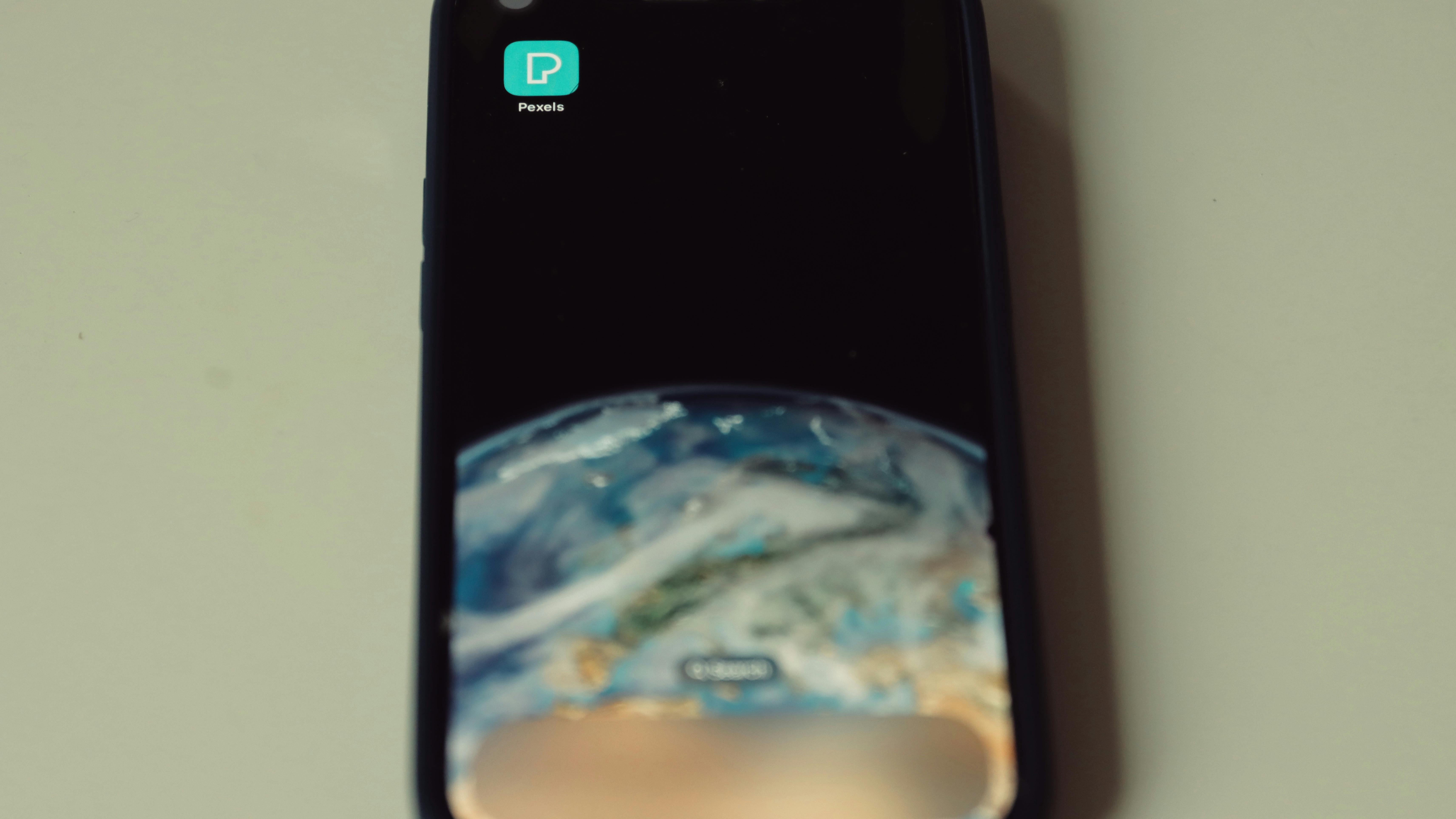 5G ISP investment news: People converse outside a modern glass building.