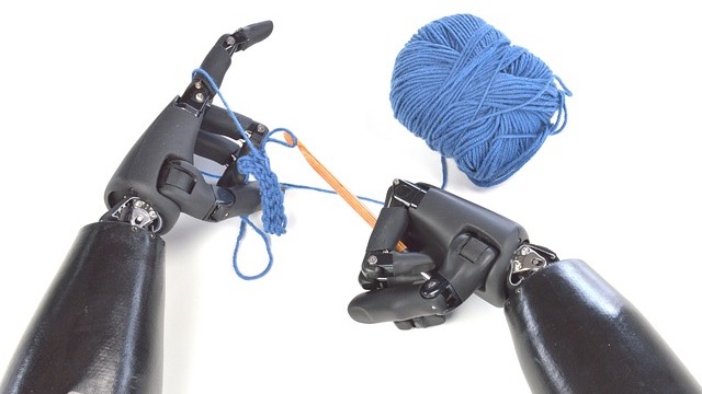 AI professionals discussing in tech server room, highlighting real cost of AI talent.