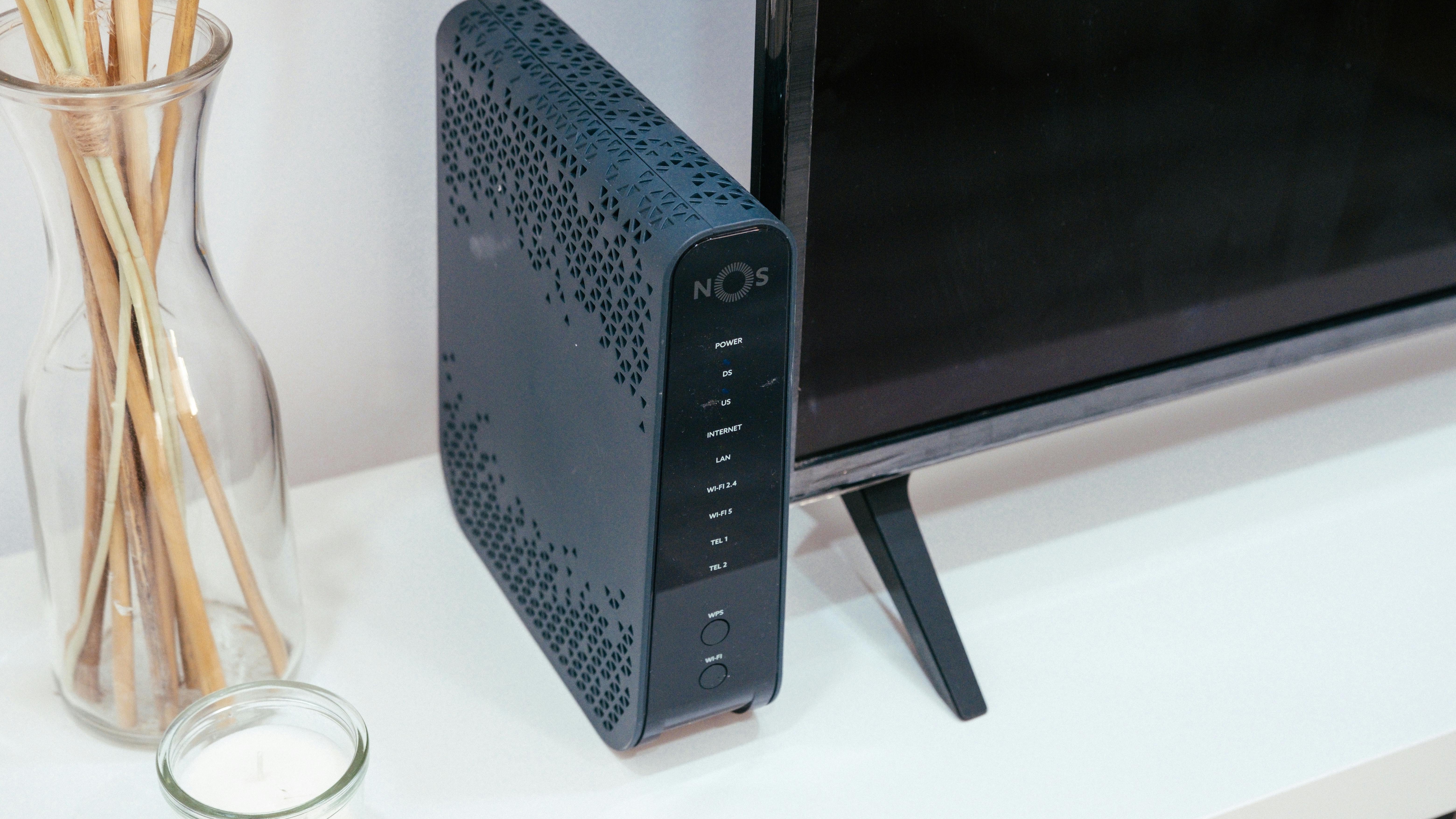 Modern Wi-Fi router designed to improve signal with a sleek design.