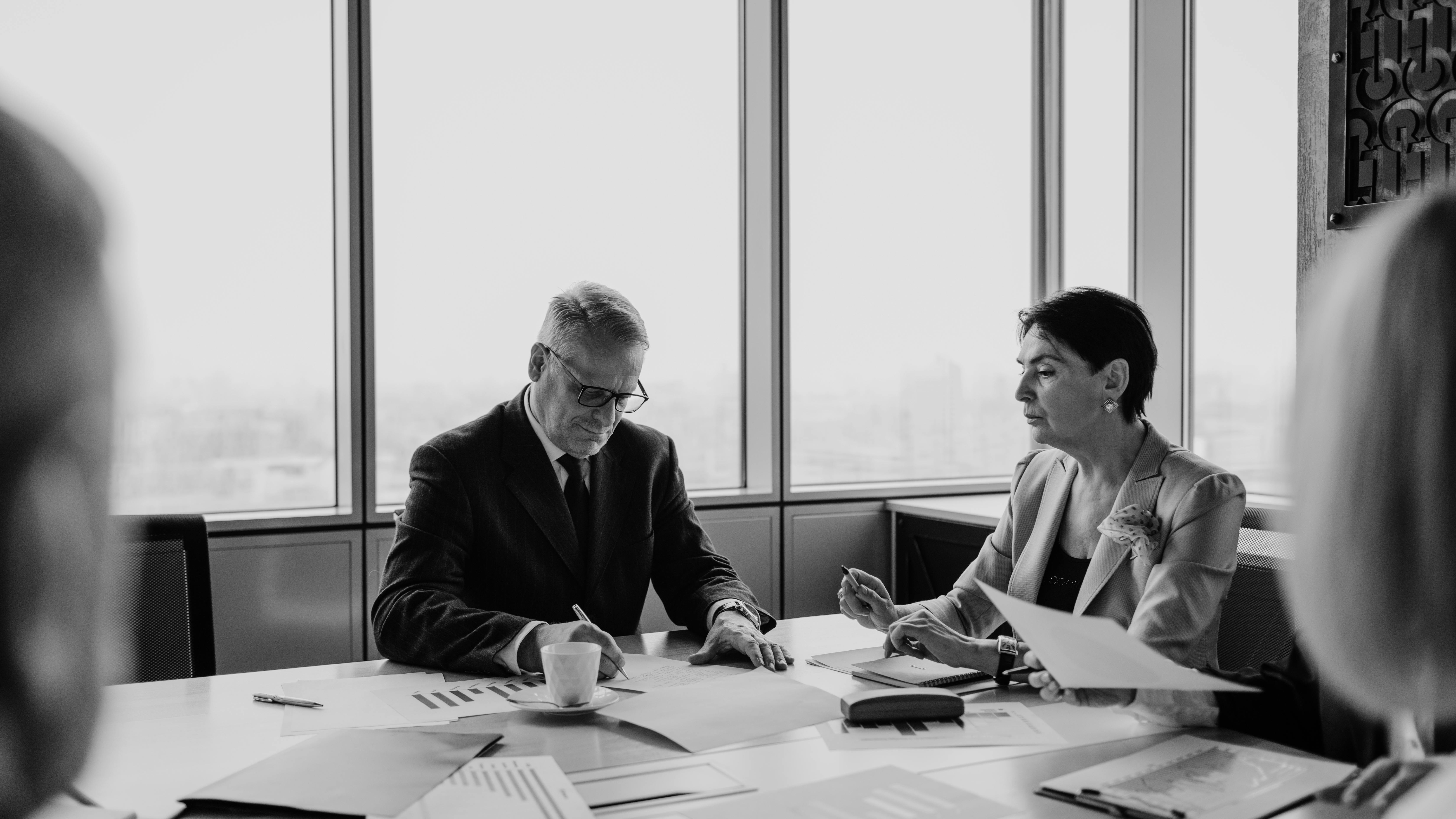 Smiling man outdoors, phrases HR needs to abandon setting.