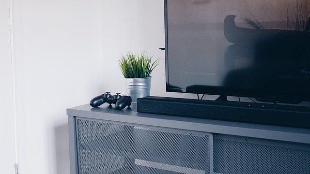 Vintage home office decor with wooden furniture and art.