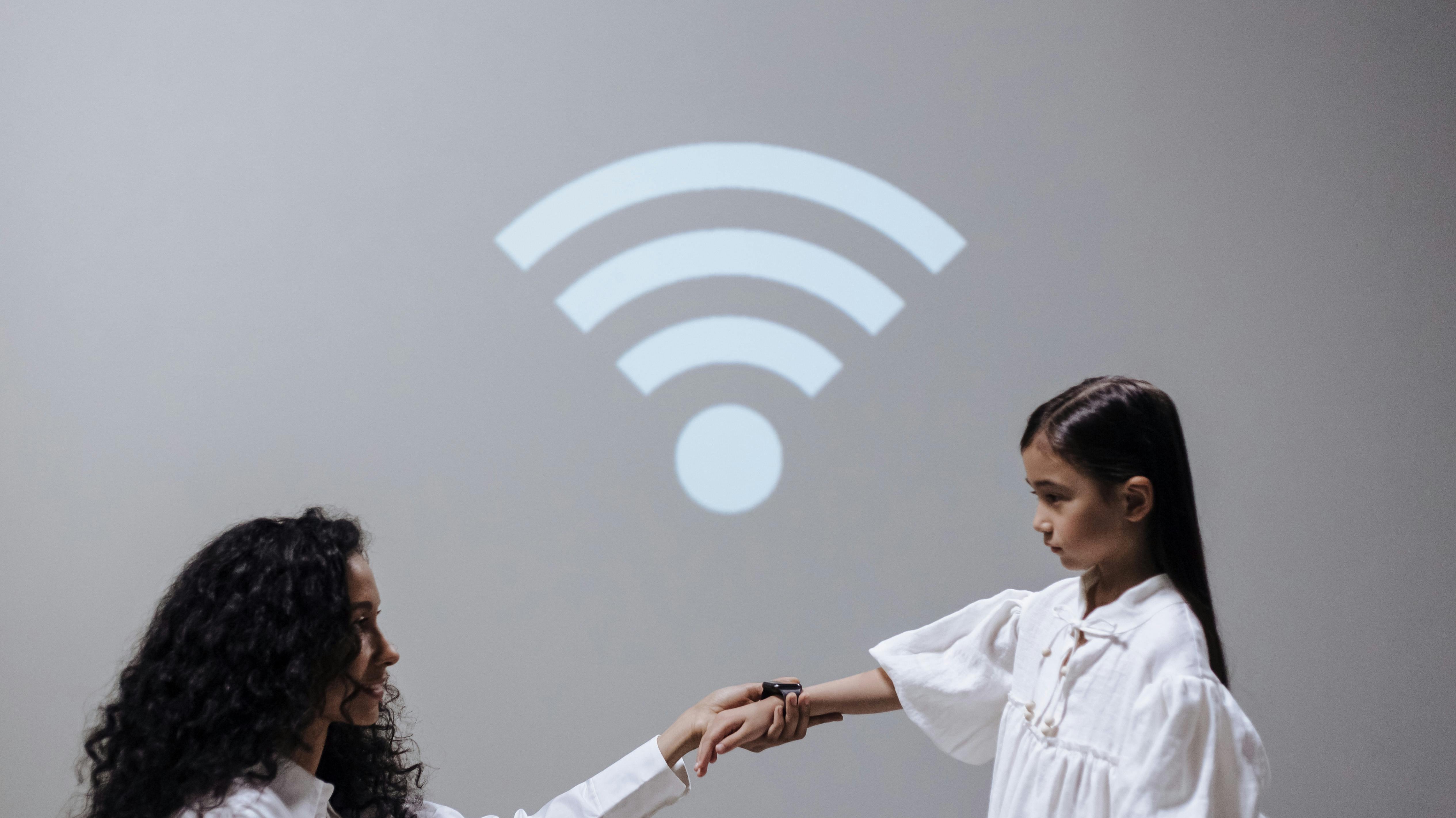 Young woman using a laptop for research on Best 5G Home Internet Providers
